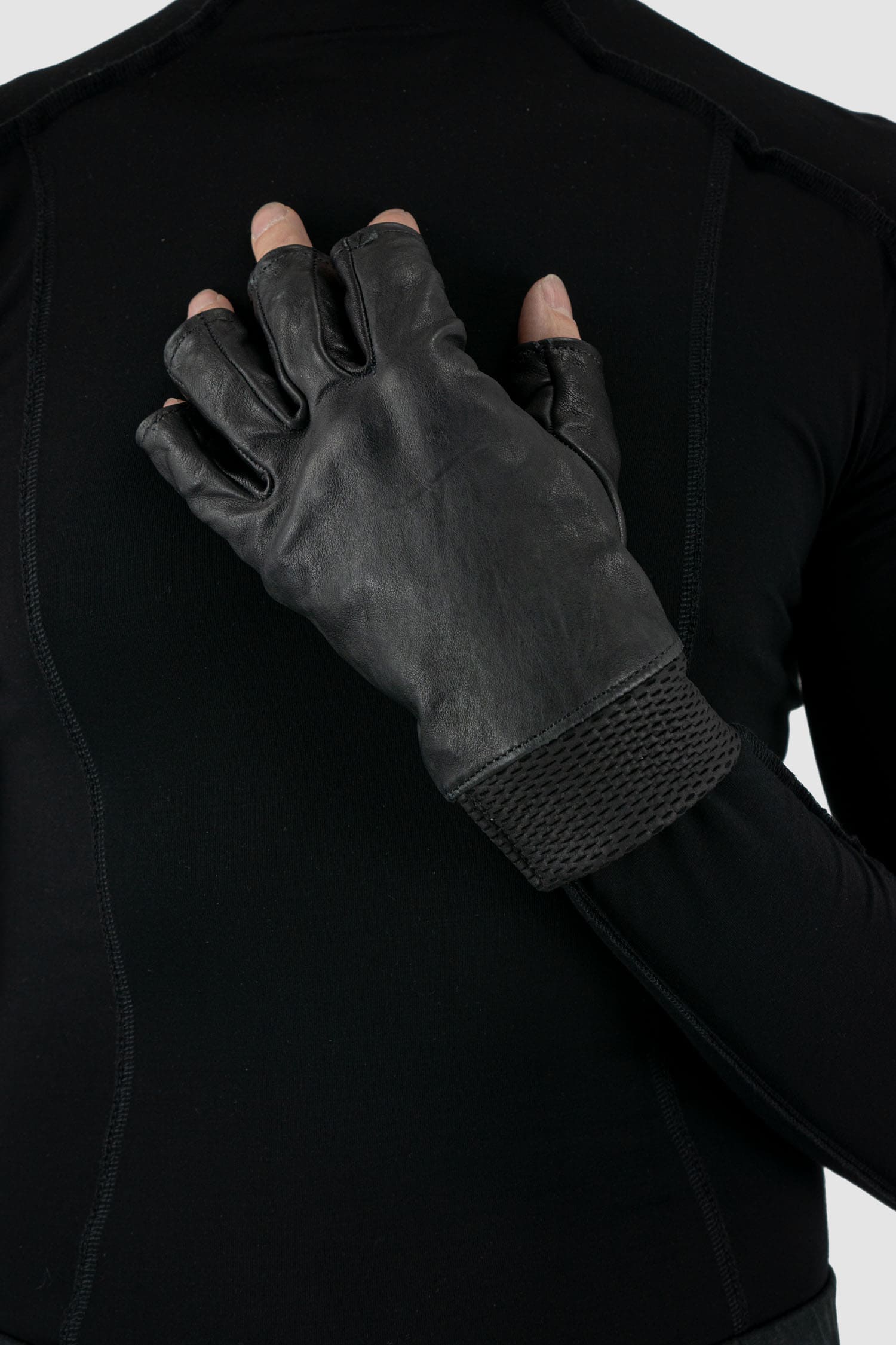 0.Hide - single model detail view of Vegetable Tanned Black Kangaroo Leather Gloves. From the Permanent Collection with Perforated Leather "knit" Detail Cuffs