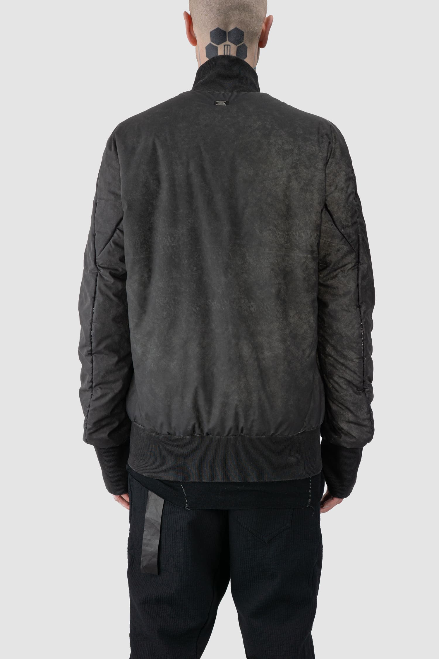 69 by Isaac Sellam - back view of grey Reflective Object-Dyed Padded Nylon Bomber Jacket
