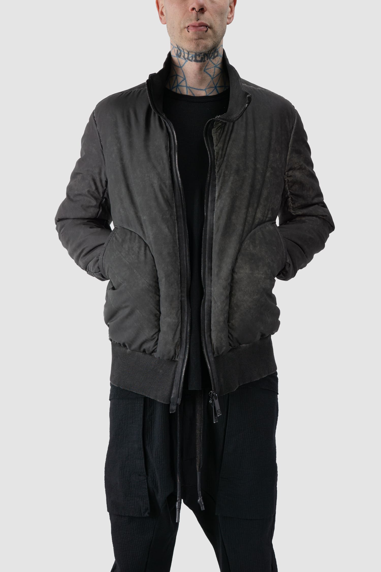 69 by Isaac Sellam - front pocket view of grey Reflective Object-Dyed Padded Nylon Bomber Jacket