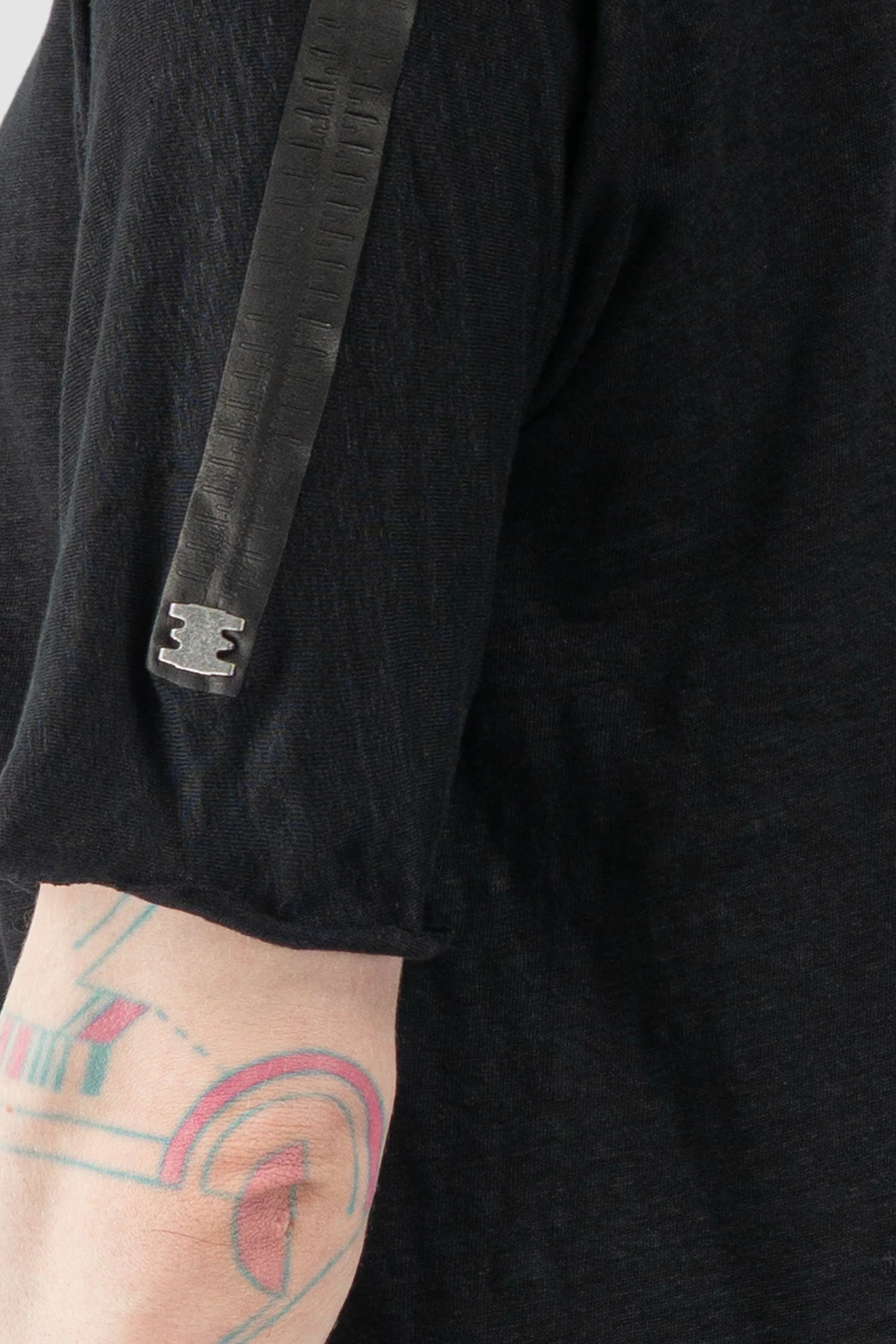 69 by Isaac Sellam - Men’s Black Linen T-Shirt with Horizontal Leather Detail metal close up view