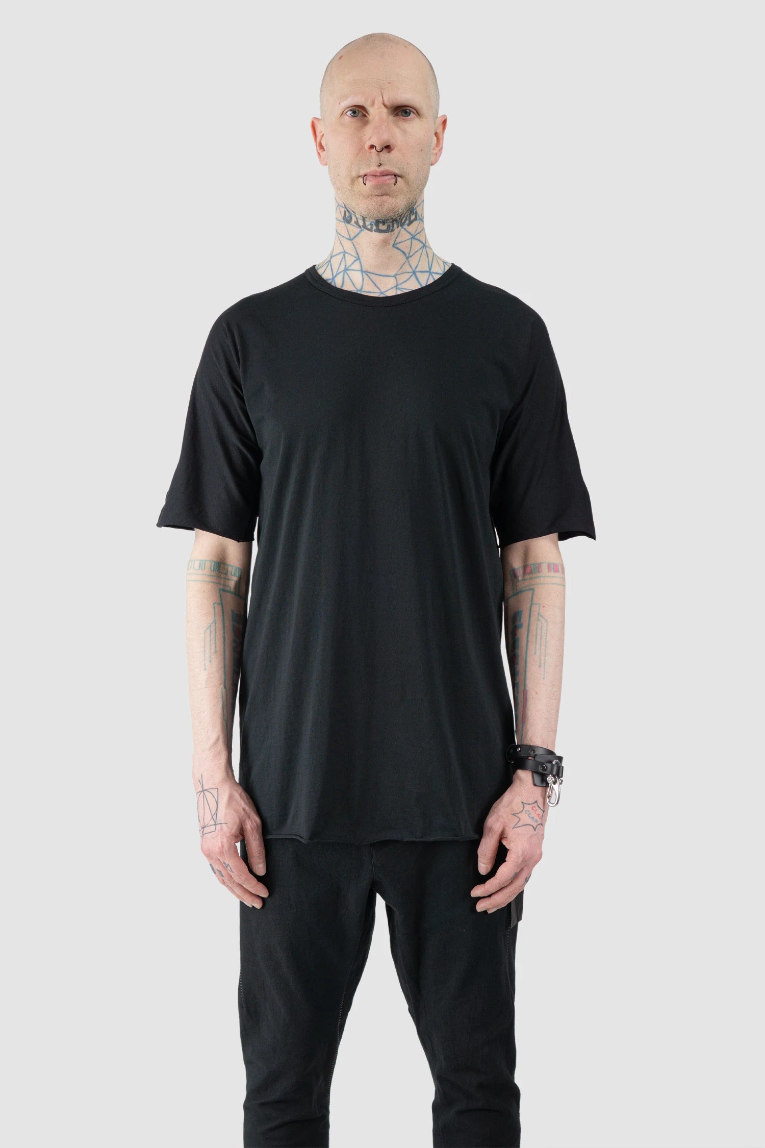 69 by Isaac Sellam - Men’s Black Organic Cotton T-Shirt with Leather Details model front view