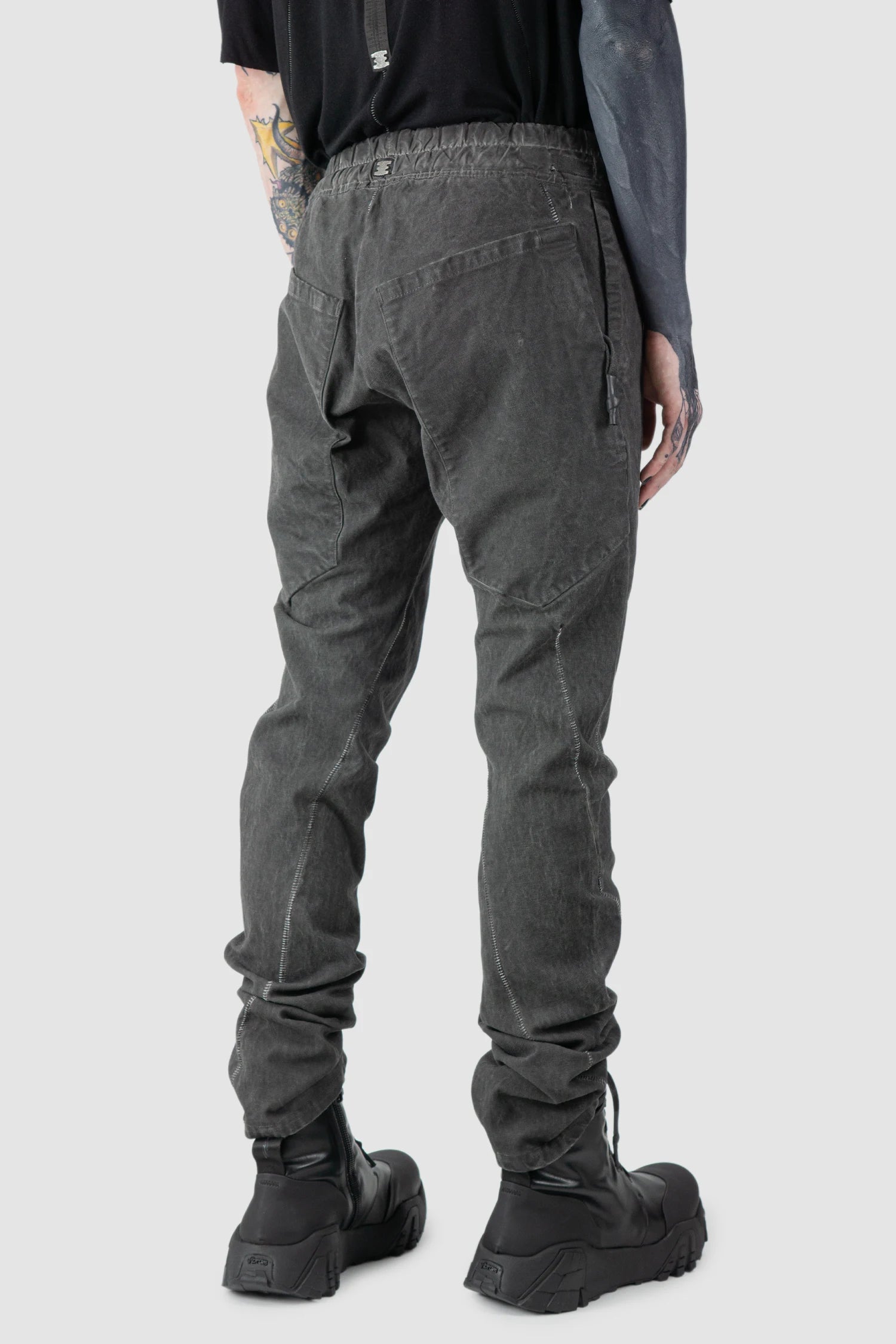 69 by Isaac Sellam - model back side view of Grey 6 Pocket Garment-Dyed Cotton Cargo Pants