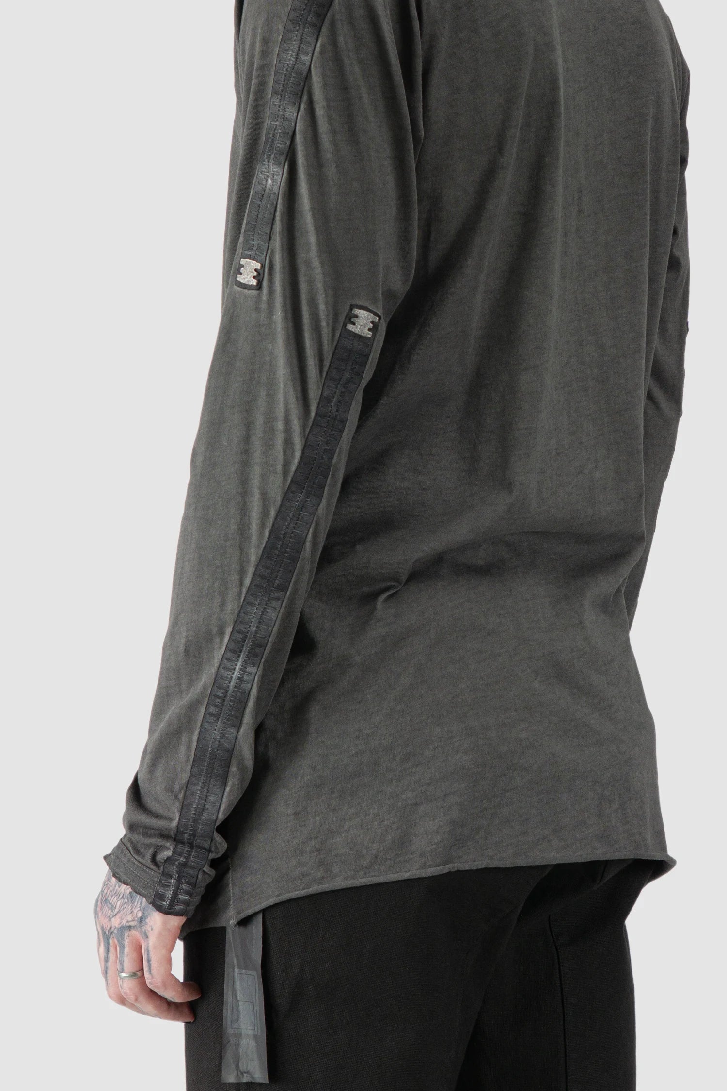 69 by Isaac Sellam - model arm detail view of Grey Object Dyed Leather Spine Long Sleeve T-Shirt