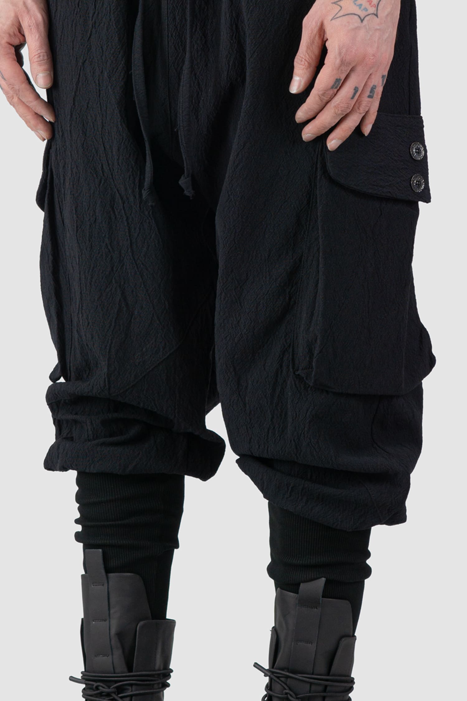 La Haine Inside Us - front detail view of black Buffed Cotton Jacquard Cargo Trousers