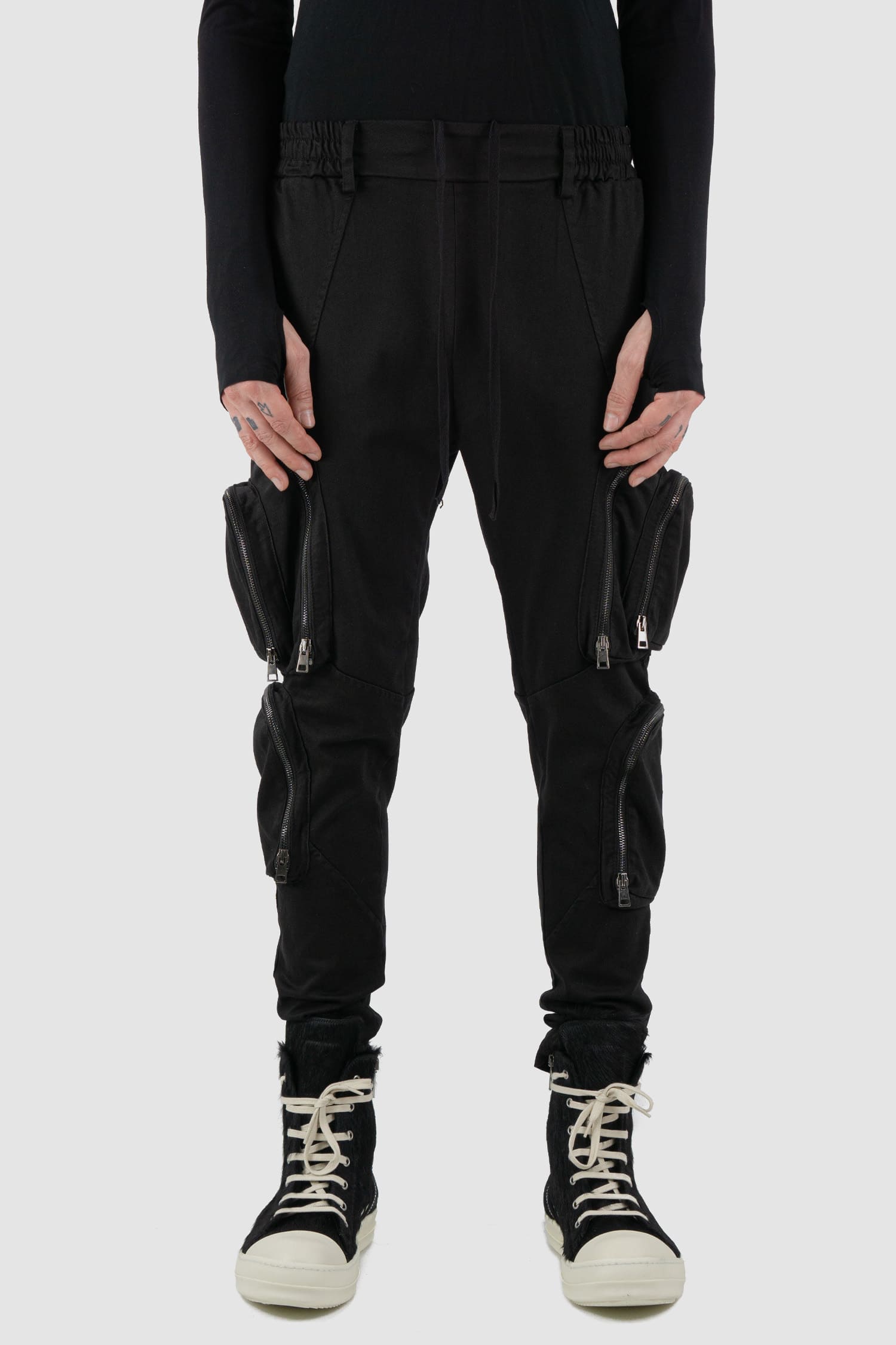 La Haine Inside Us - front view of black cargo trousers with zipper for men from the FW24 collection made of warm dyed cotton.