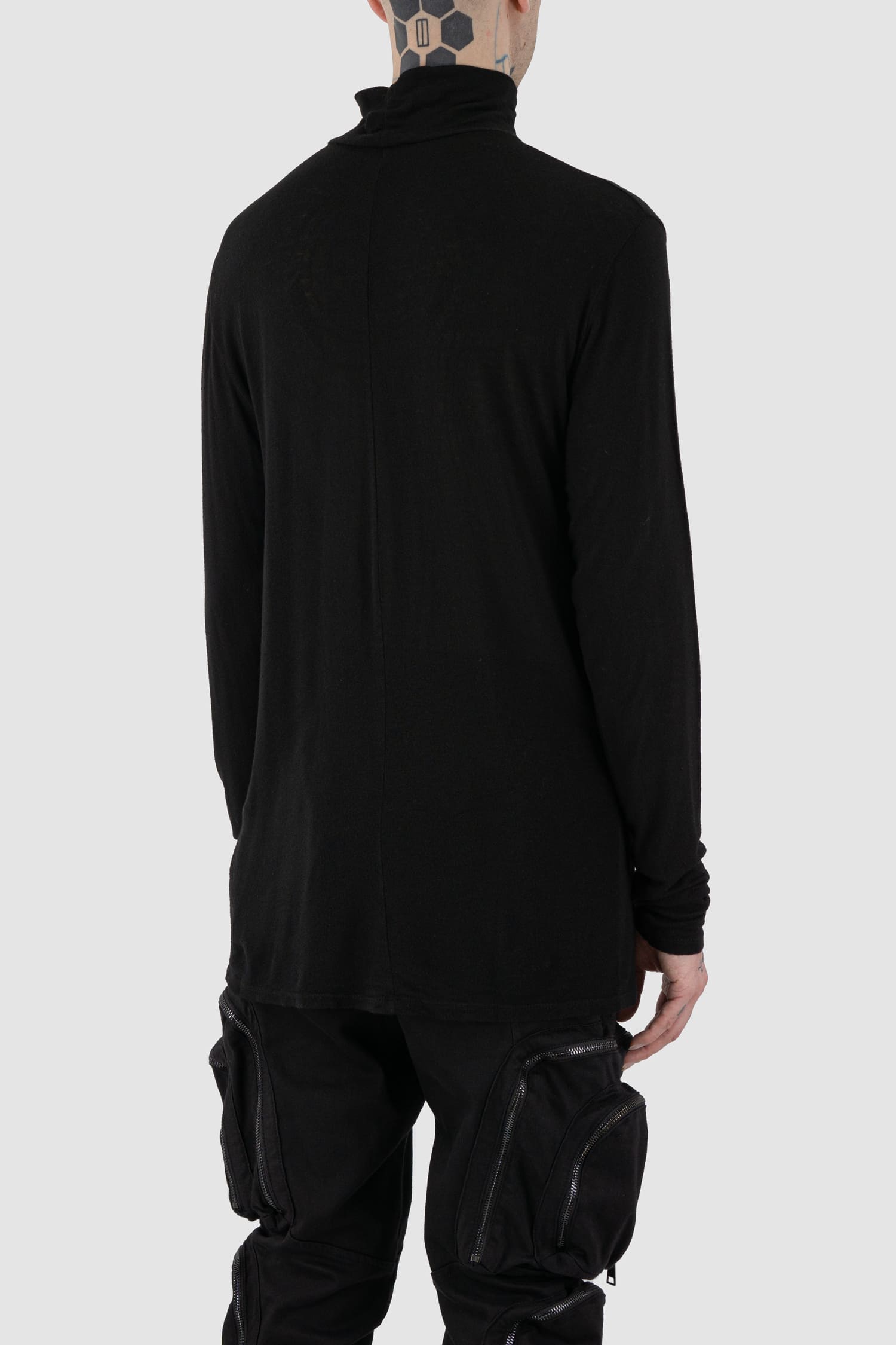 La Haine Inside Us - back side view of black high neck wool and viscose blend sweater for men from the FW24 collection with extra long sleeves, center back seam and a light and soft touch.