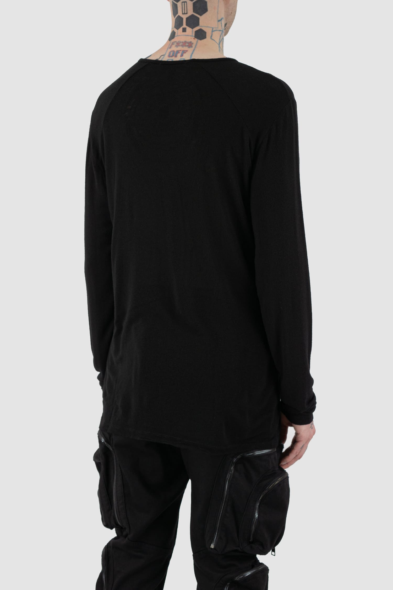 La Haine Inside Us - back side view of black thin wool and viscose blend sweater for men from the FW24 collection with extra-long sleeves, a round neckline and a light and soft feel.