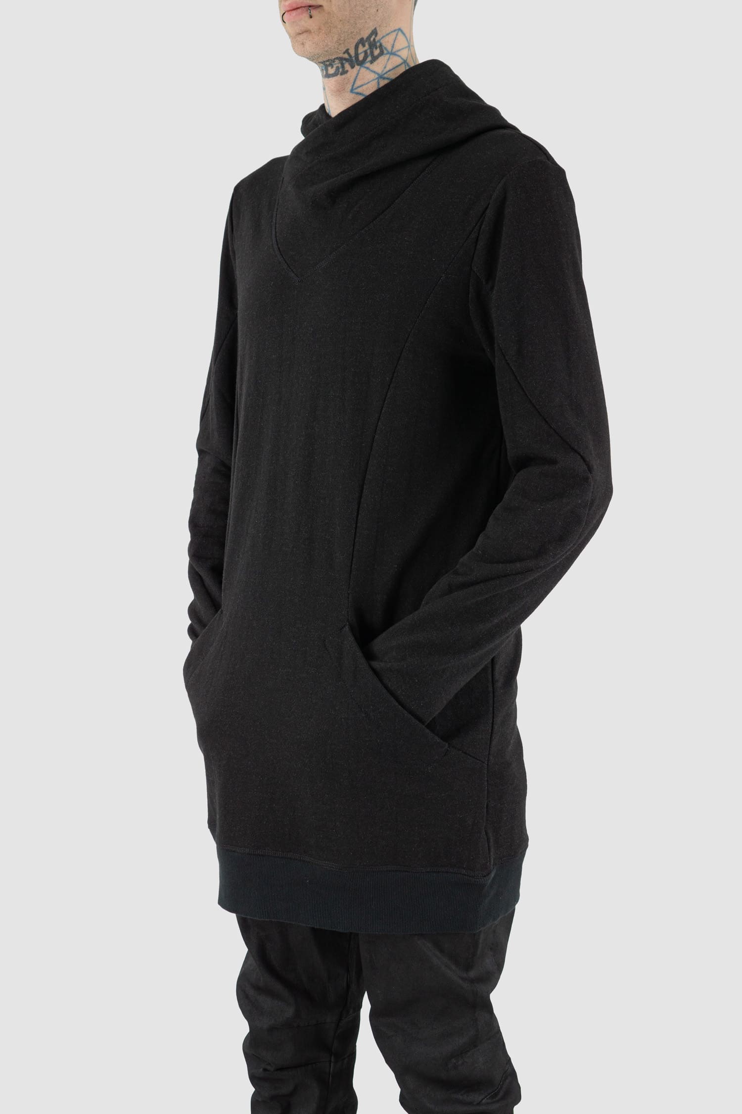 Leon Louis - pocket view of black cotton bulk hood sweater with thumbhole details, kangaroo pockets, men's Permanent Collection.