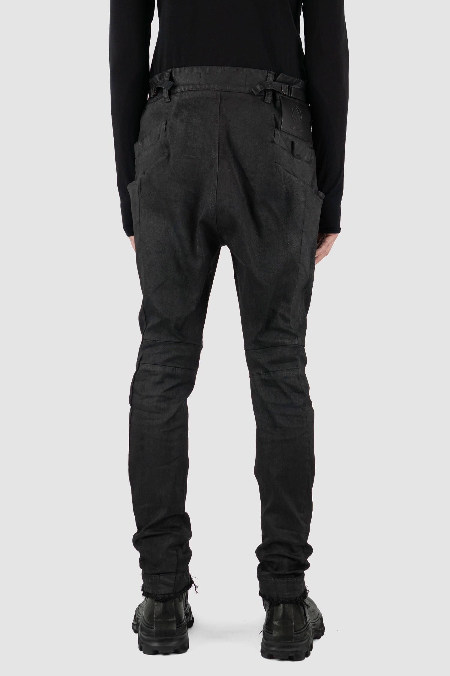 Leon Louis - Back view of black waxed Xeon shaped line denim jeans, slim fit, men's Permanent Collection.