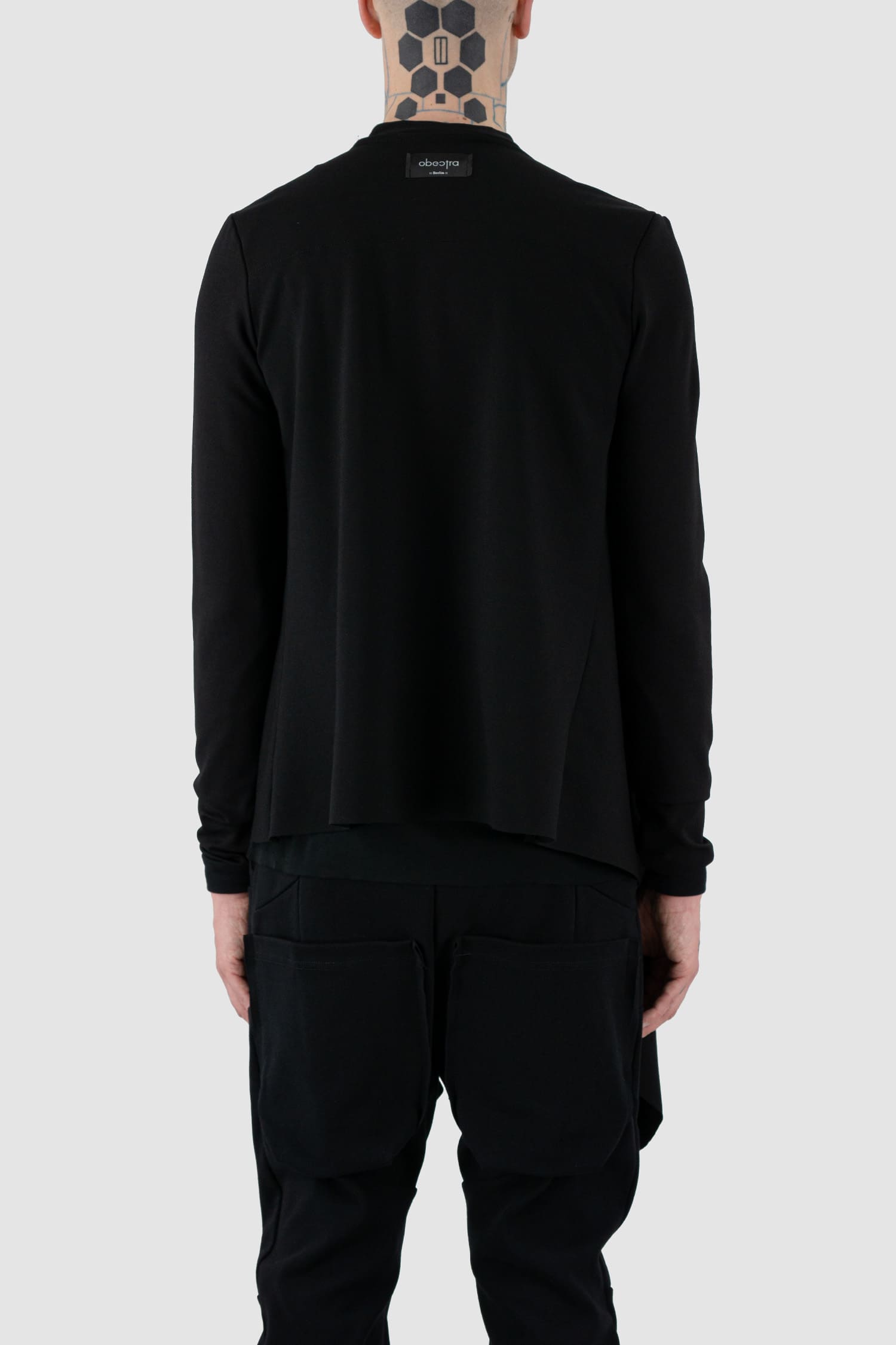 Obectra Studio - Back view of black clip cardigan with multiple clips for different styling options, slim fit, Permanent Collection.
