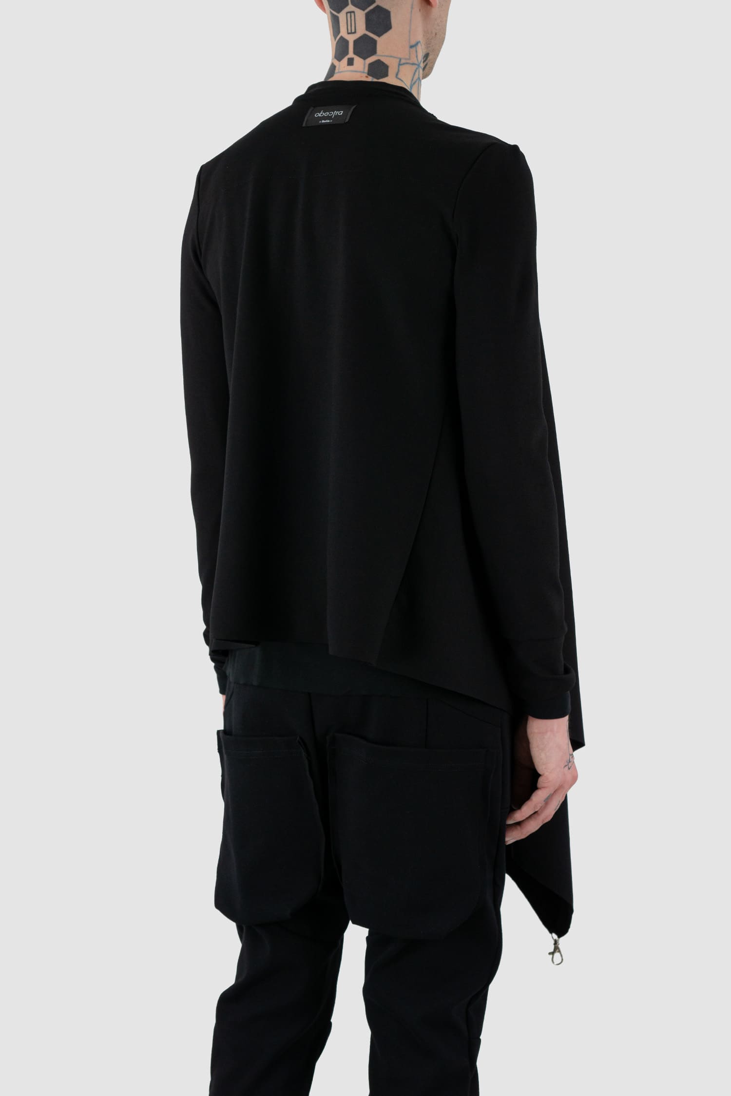 Obectra Studio - Back side view of black clip cardigan with multiple clips for different styling options, slim fit, Permanent Collection.