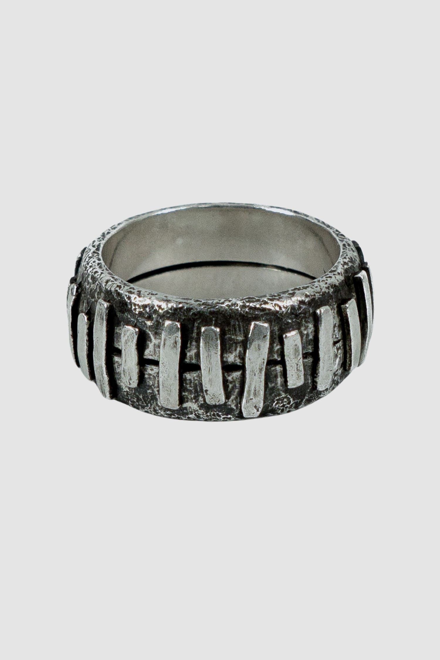 Olivier Jewelry - left view of 925 silver Stitched ring from Permanent collection with irregular silver patches added on 2 rings to combine.β¨