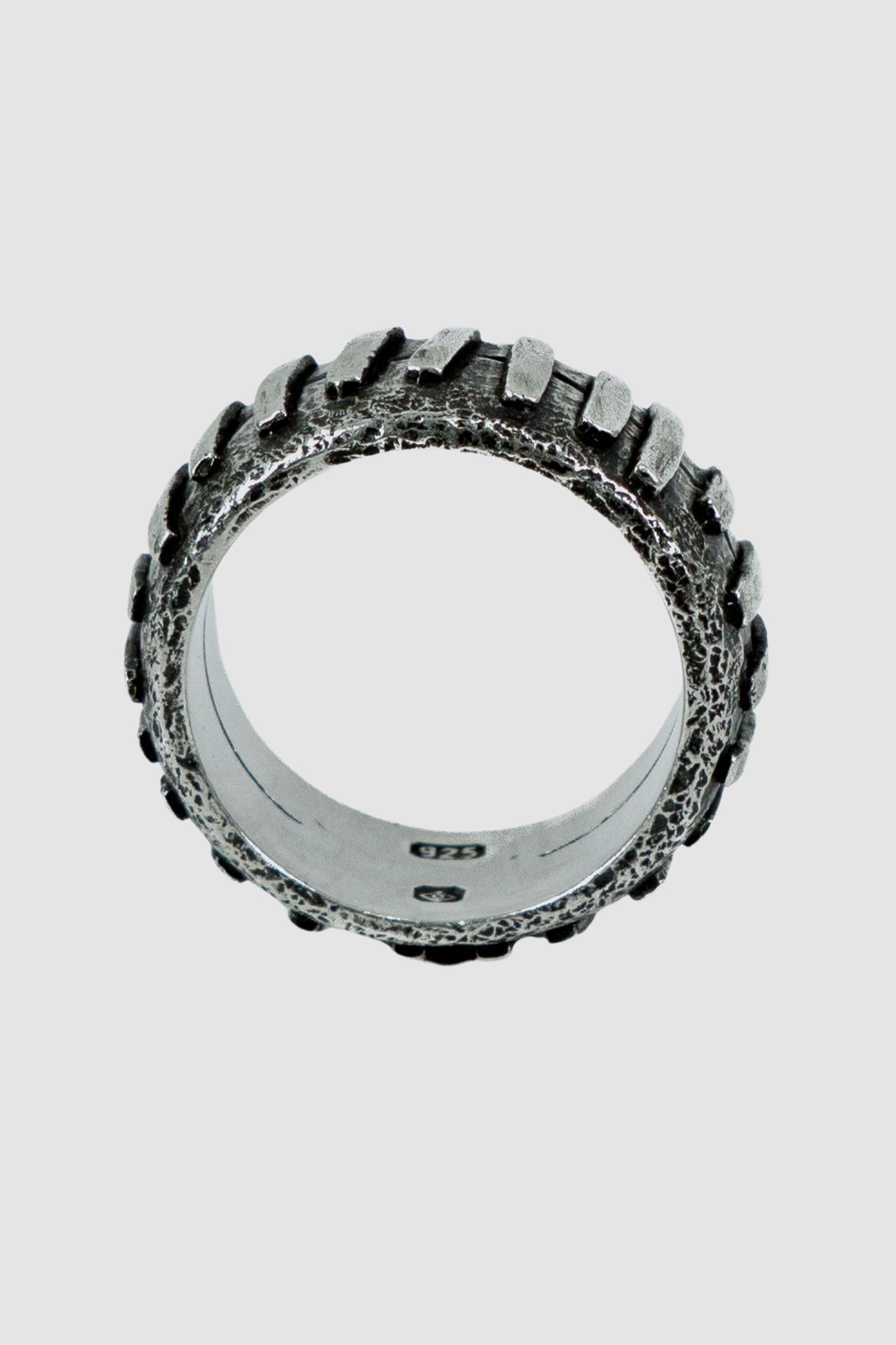 Olivier Jewelry - stand alone view of 925 silver Stitched ring from Permanent collection with irregular silver patches added on 2 rings to combine.β¨