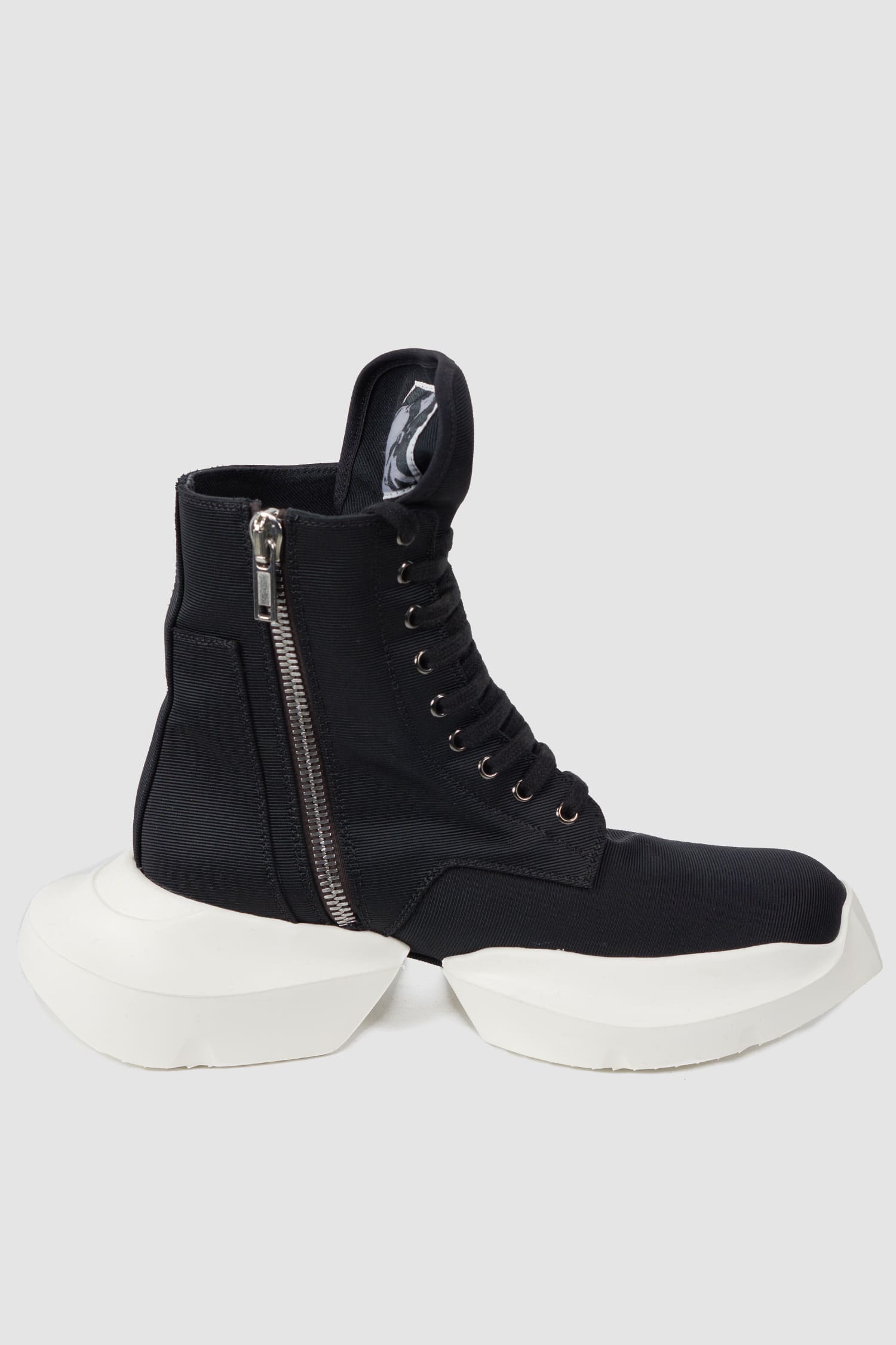 Rick Owens DRKSHDW - left shoe of the black Army Split Sole Sneaker.