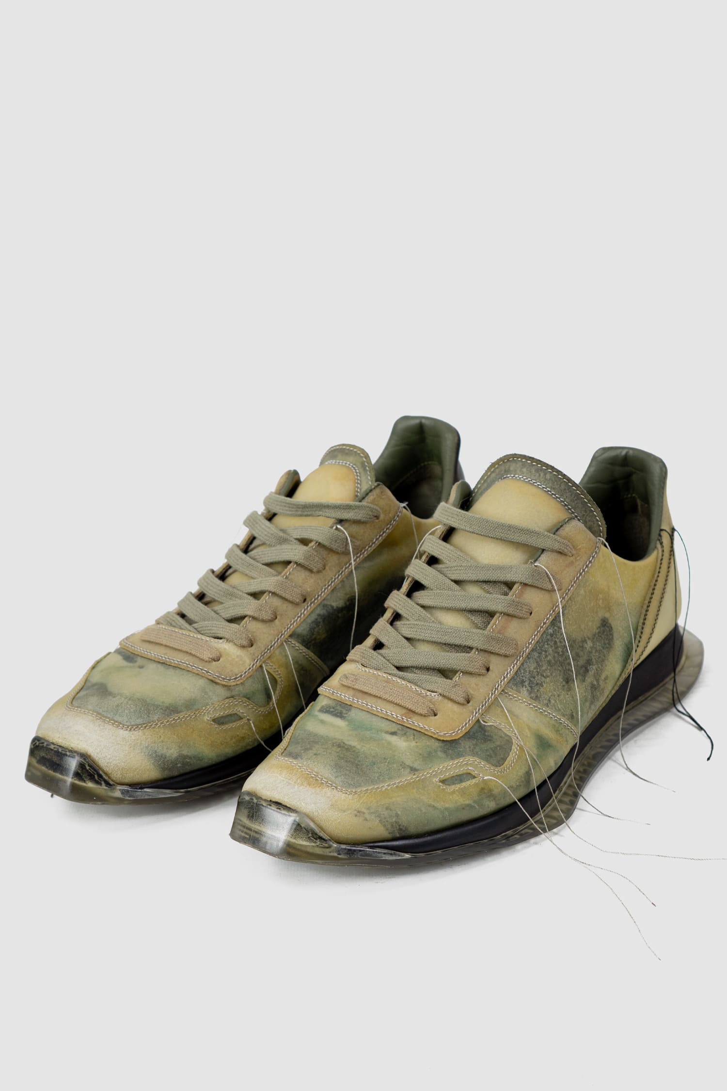 Rick Owens - pair left view of green Translucent Leather Low-Top Trainer Sneakers
