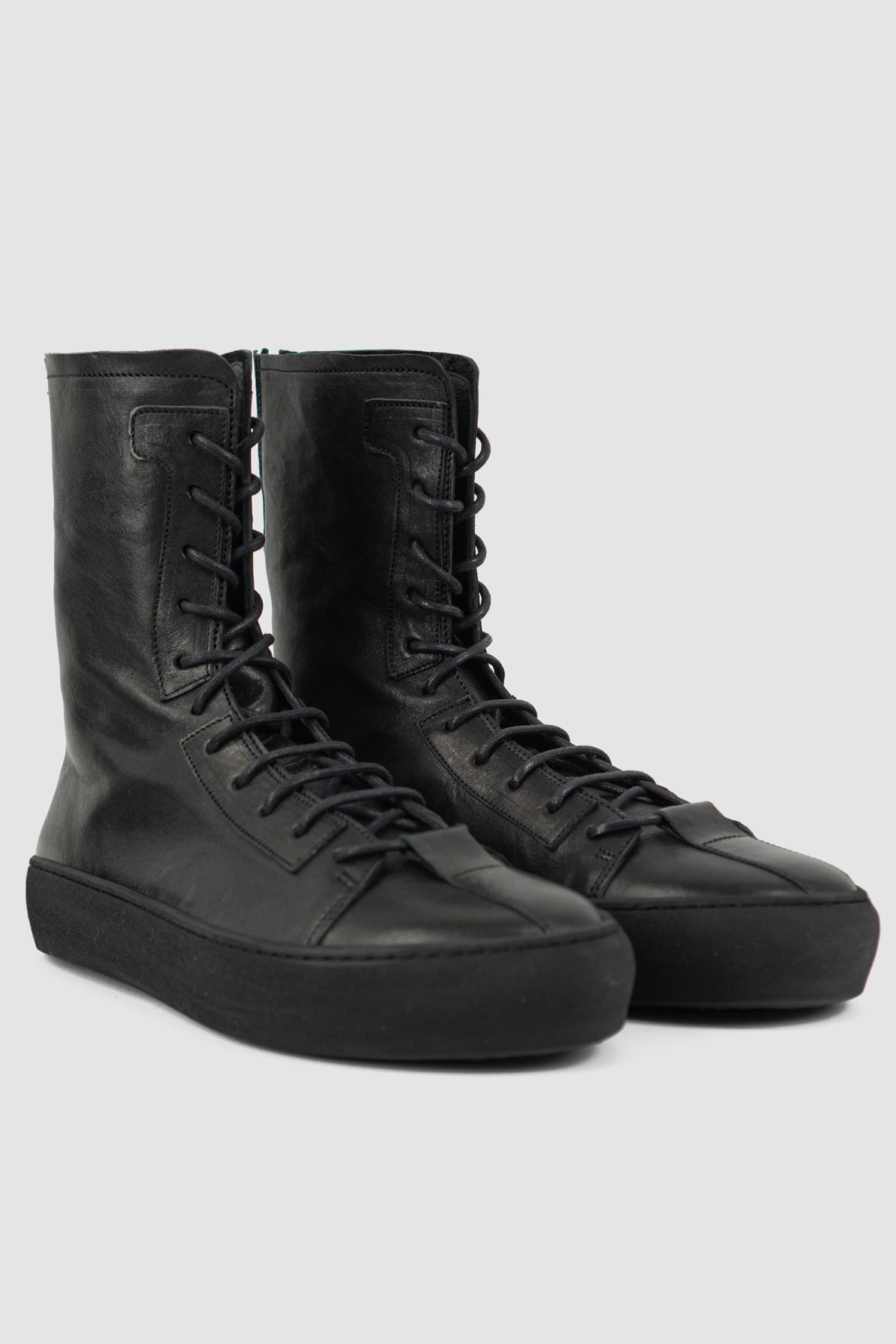 The Last Conspiracy - front right view of Black Leather High Top Sneaker for Men from SS24 Collection with Excella Back Zip Detail.