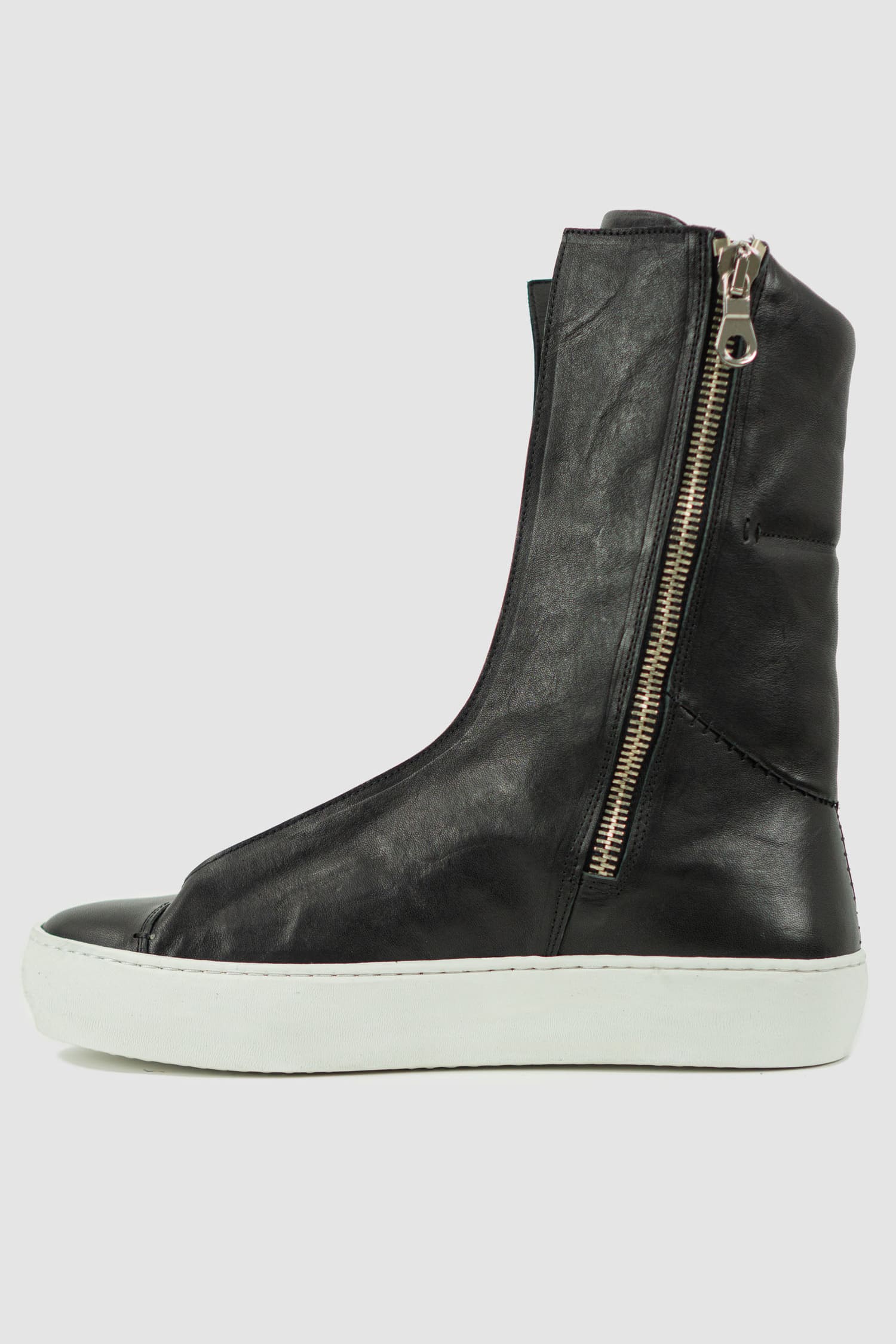The Last Conspiracy - left view of Black Leather High Top Sneaker for Men from the Permanent Collection with Contrast Puffed Sole.