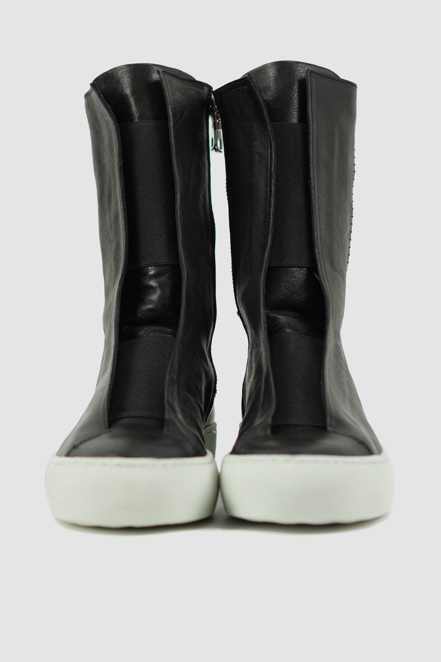 The Last Conspiracy - front view of Black Leather High Top Sneaker for Men from the Permanent Collection with Contrast Puffed Sole.