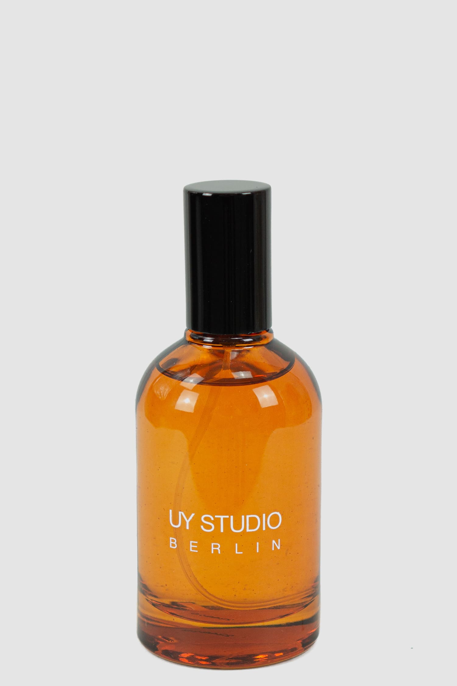 UY Studio - Front view of Signature Parfum U in 50ml amber glass flacon with plastic trigger spray, Permanent Collection.