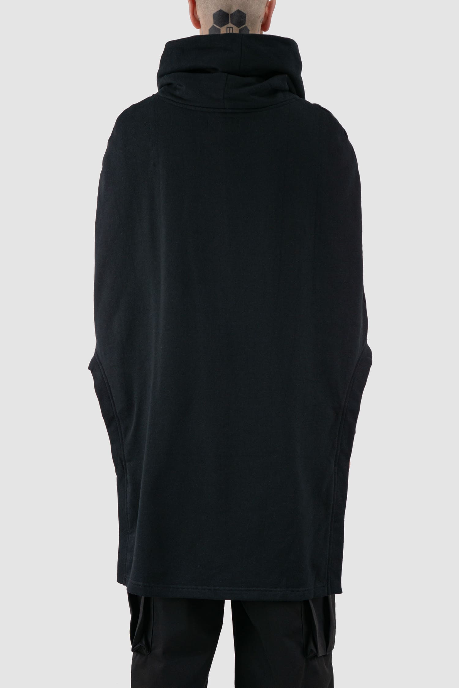 XConcept - back view of black overlapping shoulder high neck top for men with asymmetrical cut, stand-up collar, thick cotton, FW24 Collection.