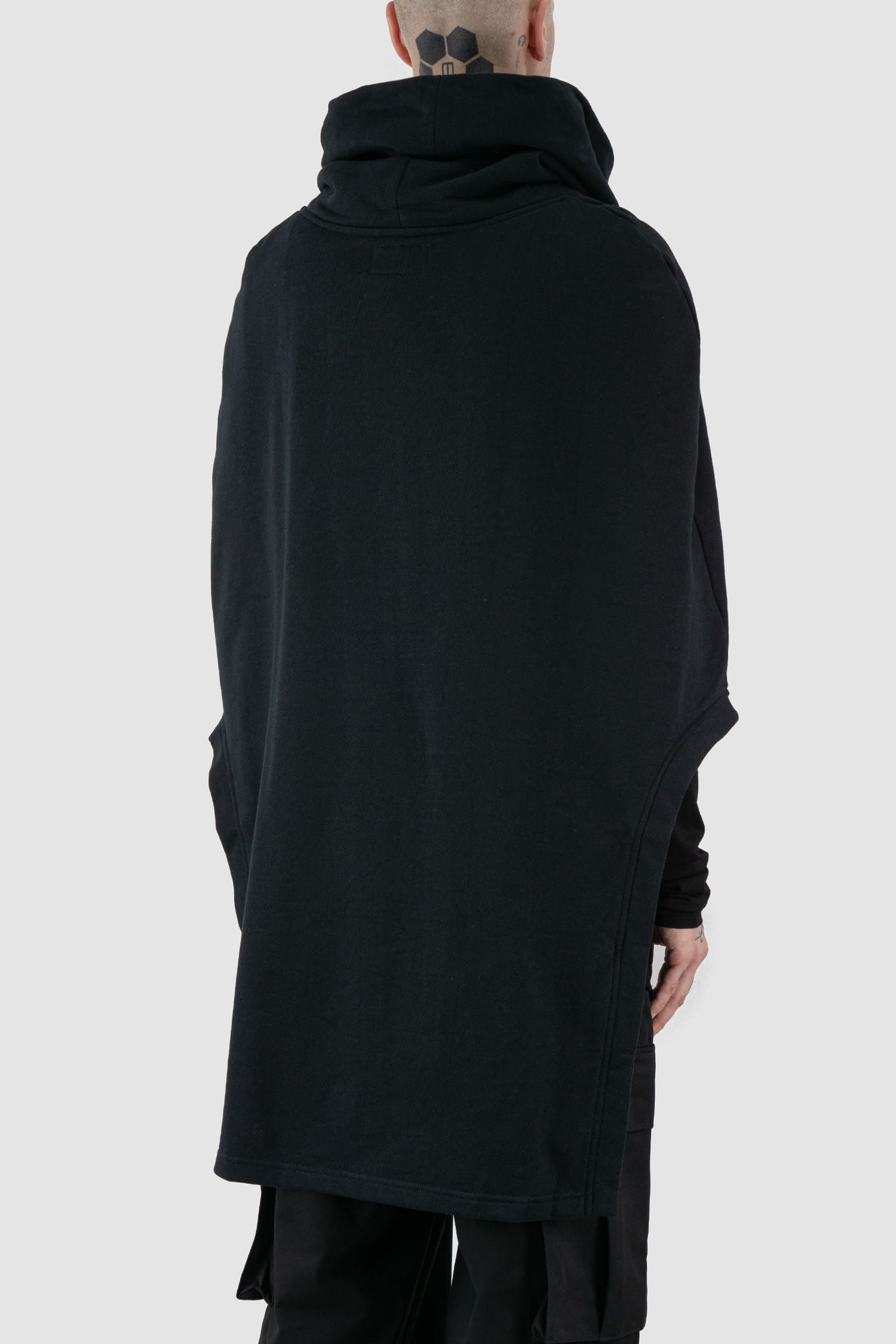 XConcept - back side view of black overlapping shoulder high neck top for men with asymmetrical cut, stand-up collar, thick cotton, FW24 Collection.