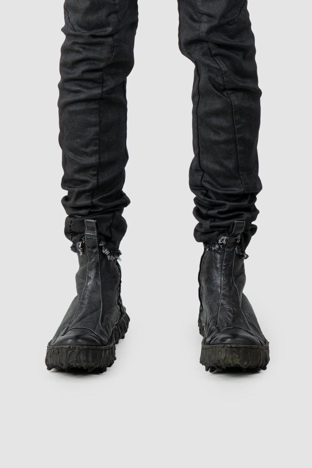 Culture of Brave - Black Chelsea Leather Sneaker - Melt Seal - Model front view Culture of Brave - Black Chelsea Leather Sneaker - Melt Seal - Model front view