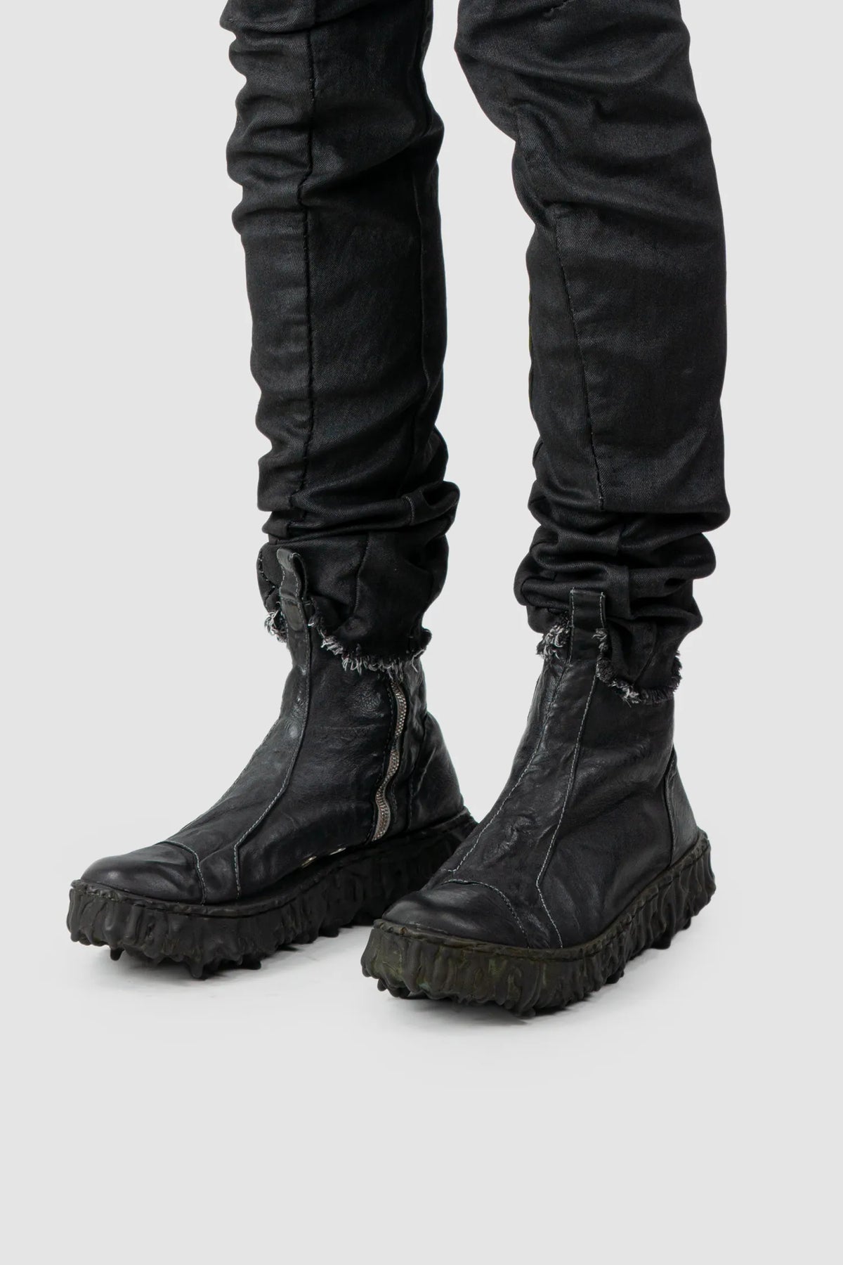 Culture of Brave - Black Chelsea Leather Sneaker - Melt Seal - Model front left view Culture of Brave - Black Chelsea Leather Sneaker - Melt Seal - Model front left view