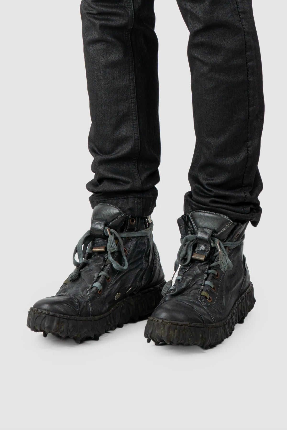 Culture of Brave - Black Slate Leather Sneaker - Melt Dan - Model front left view Culture of Brave - Black Slate Leather Sneaker - Melt Dan - Model front left view