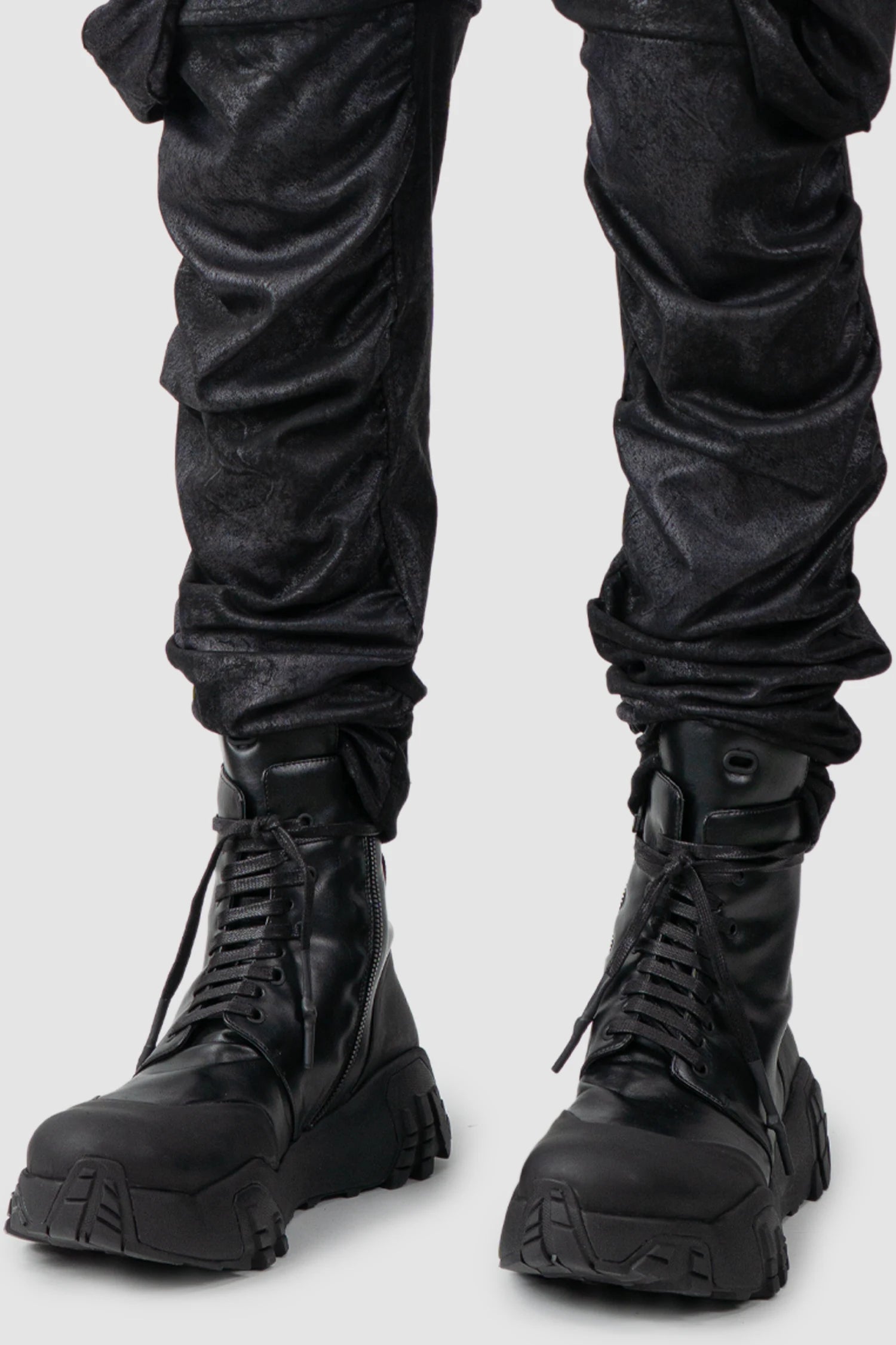 Gall Laboratories by Justin Gall - hem detail view of men’s Black Vegan Leather Convertible Cargo Trousers