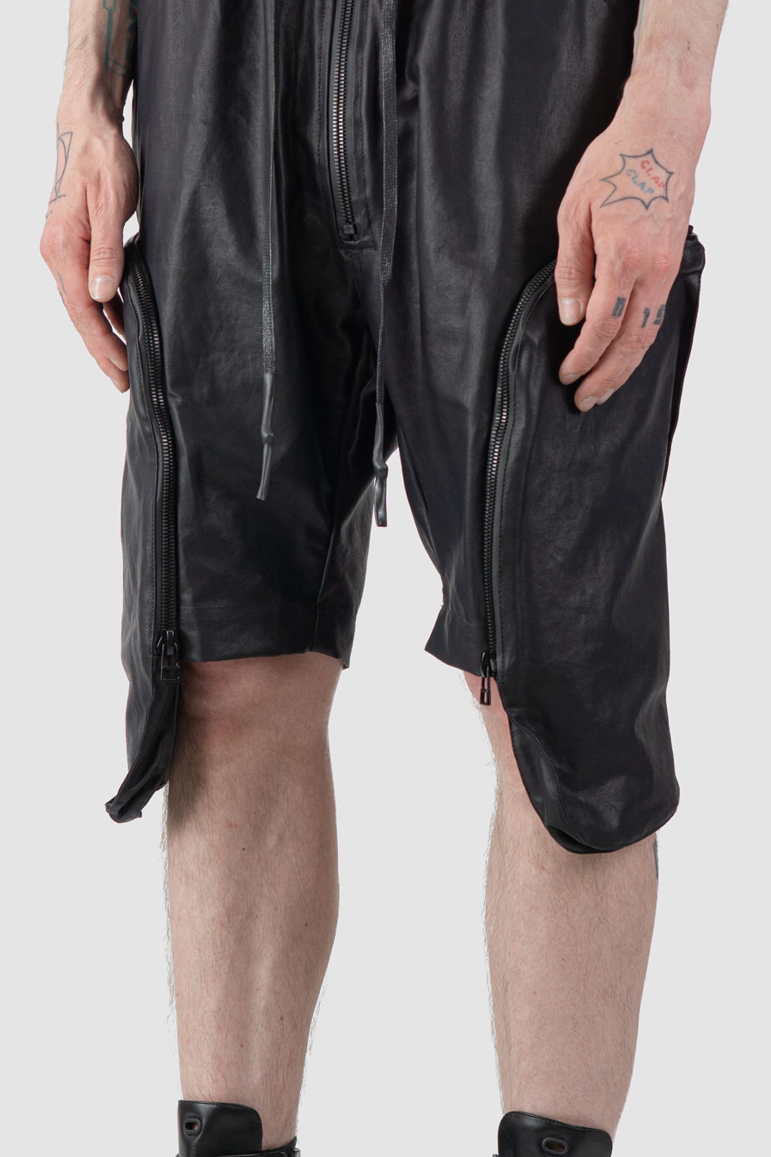Gall Laboratories by Justin Gall - front detail view of black Coated Cotton Cargo Floater Shorts