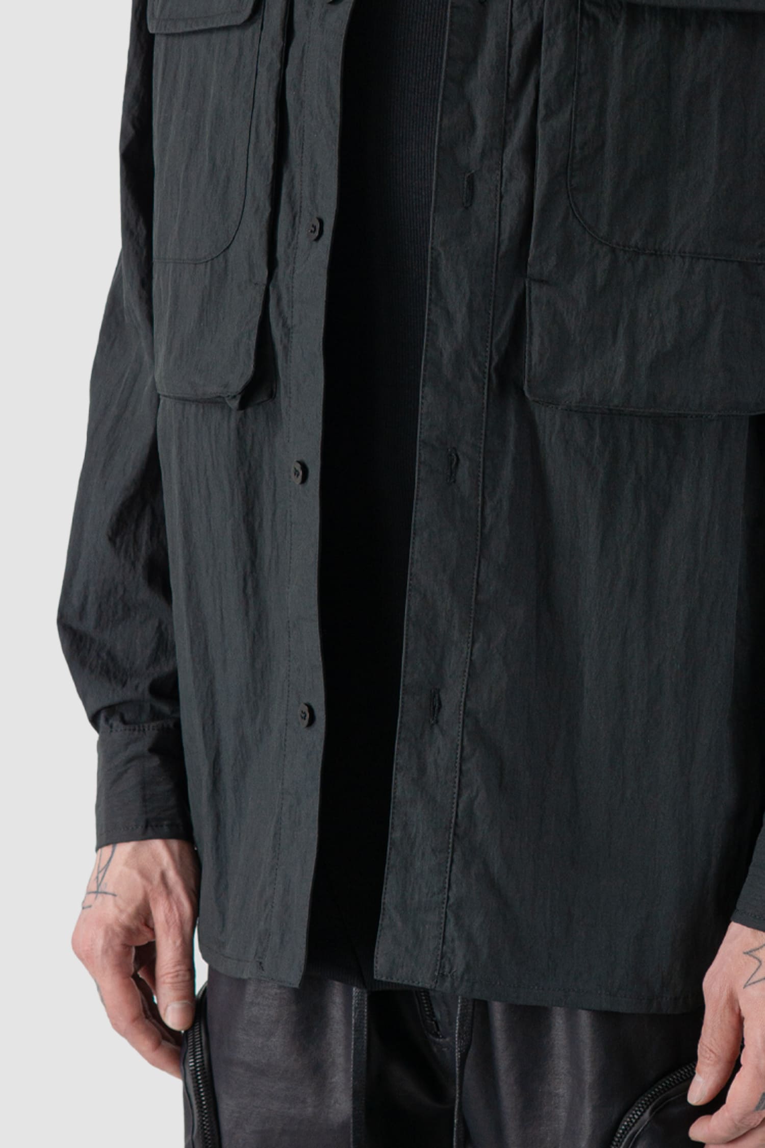 Gall Laboratories by Justin Gall - front detail view of black Cracked Cotton Long Sleeve Cargo Shirt