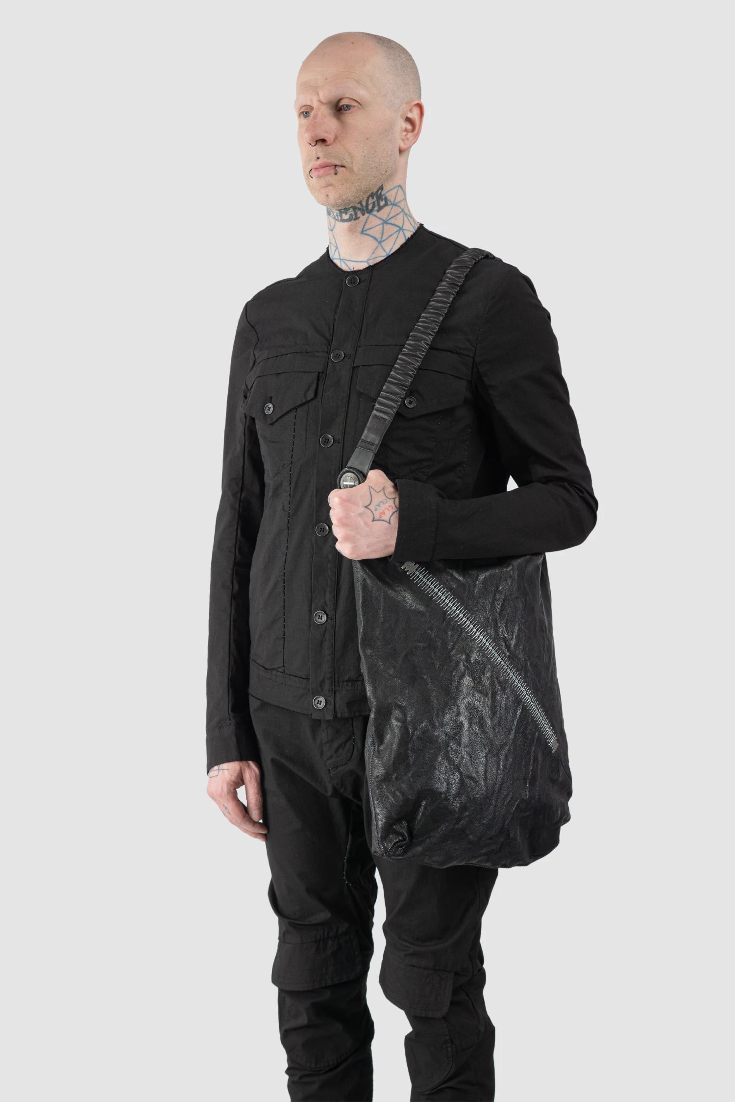 Isaac Sellam Experience - Nomade Men’s Black Asymmetric Lamb Leather Crossbody Bag model shoulder view