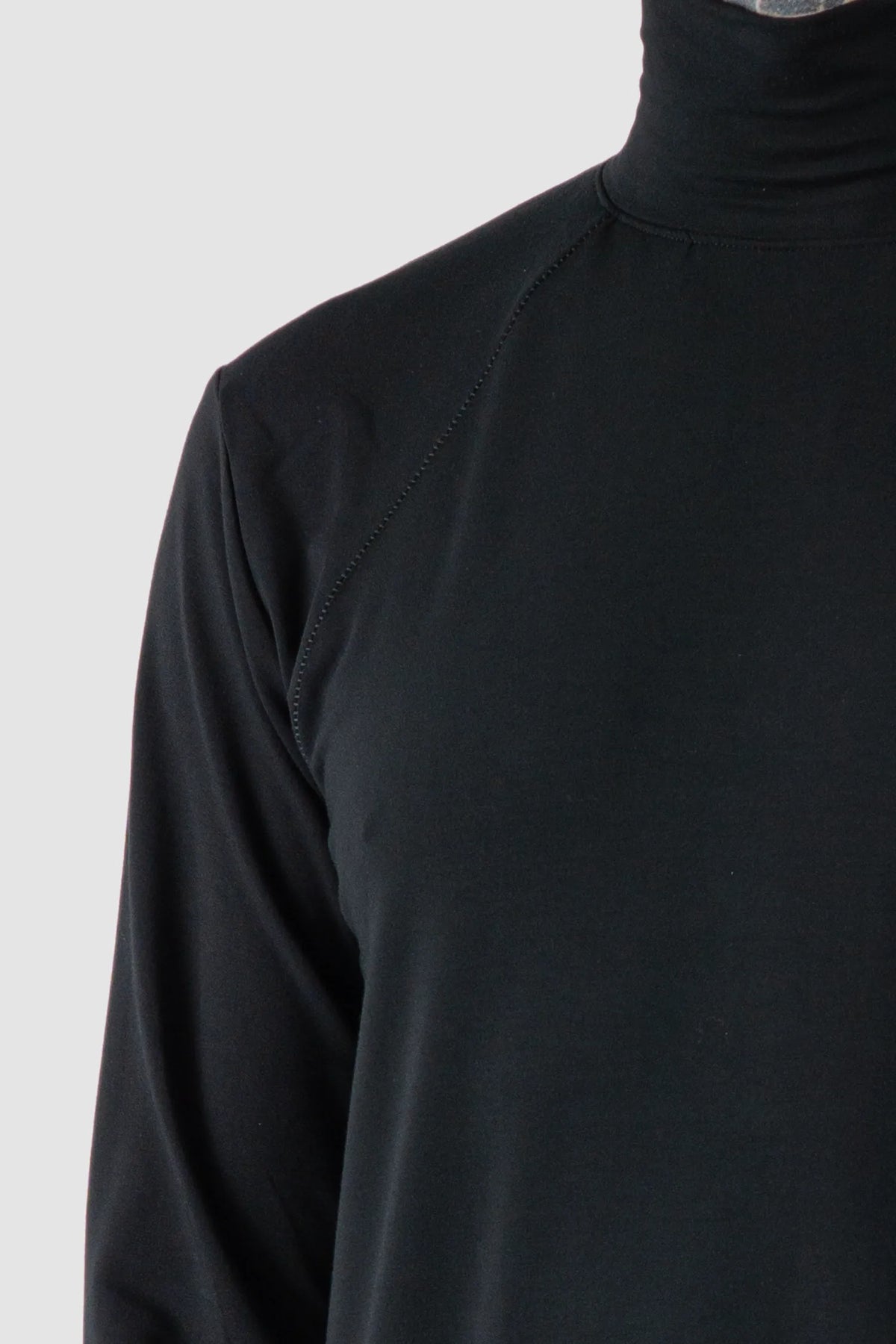 La Haine Inside Us - Men's Black Bamboo Turtleneck Sweater - Shoulder detail view La Haine Inside Us - Men's Black Bamboo Turtleneck Sweater - Shoulder detail view