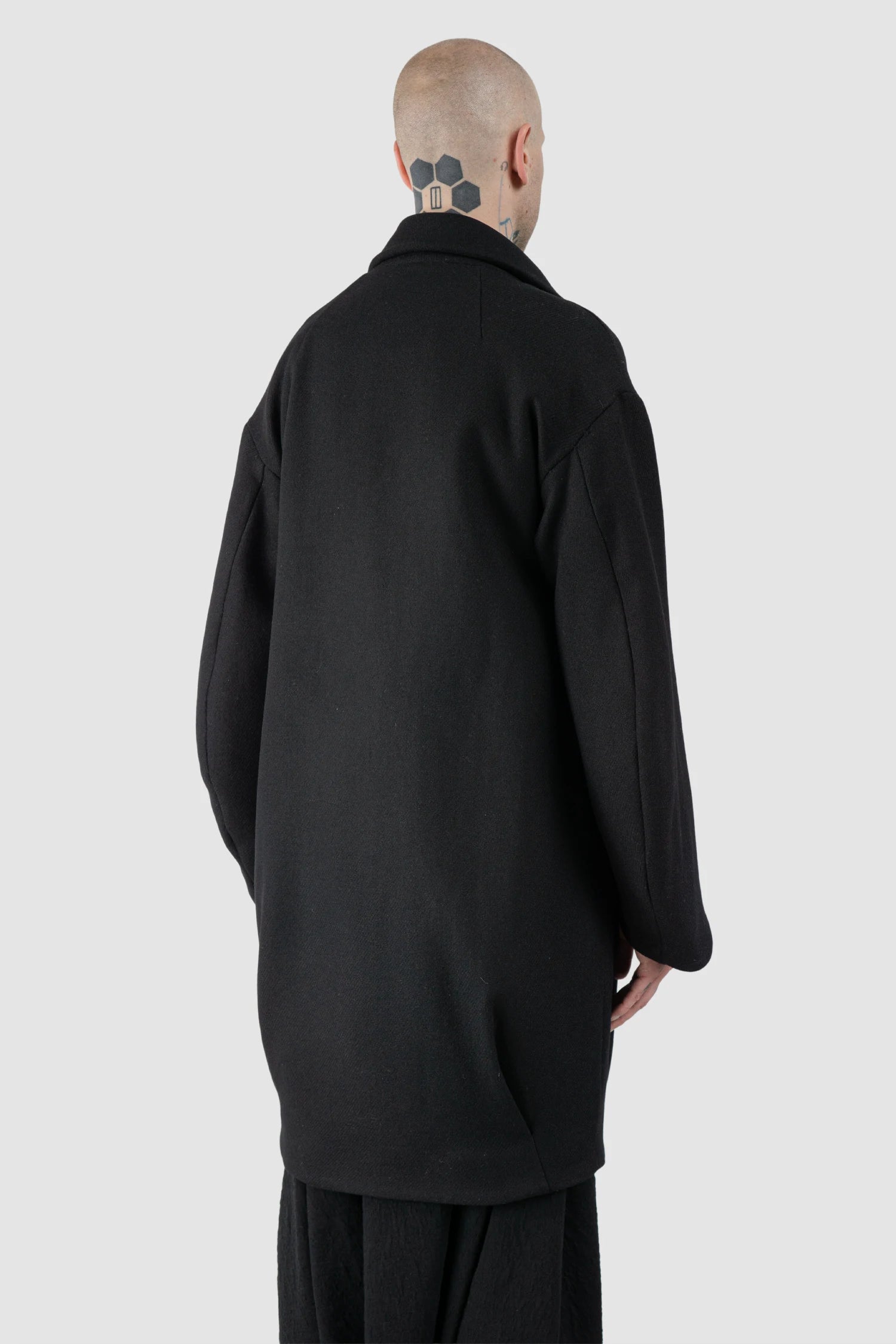 La Haine Inside Us - Men's Black Brushed Wool Blend Oversized Coat - model back side view La Haine Inside Us - Men's Black Brushed Wool Blend Oversized Coat - model back side view