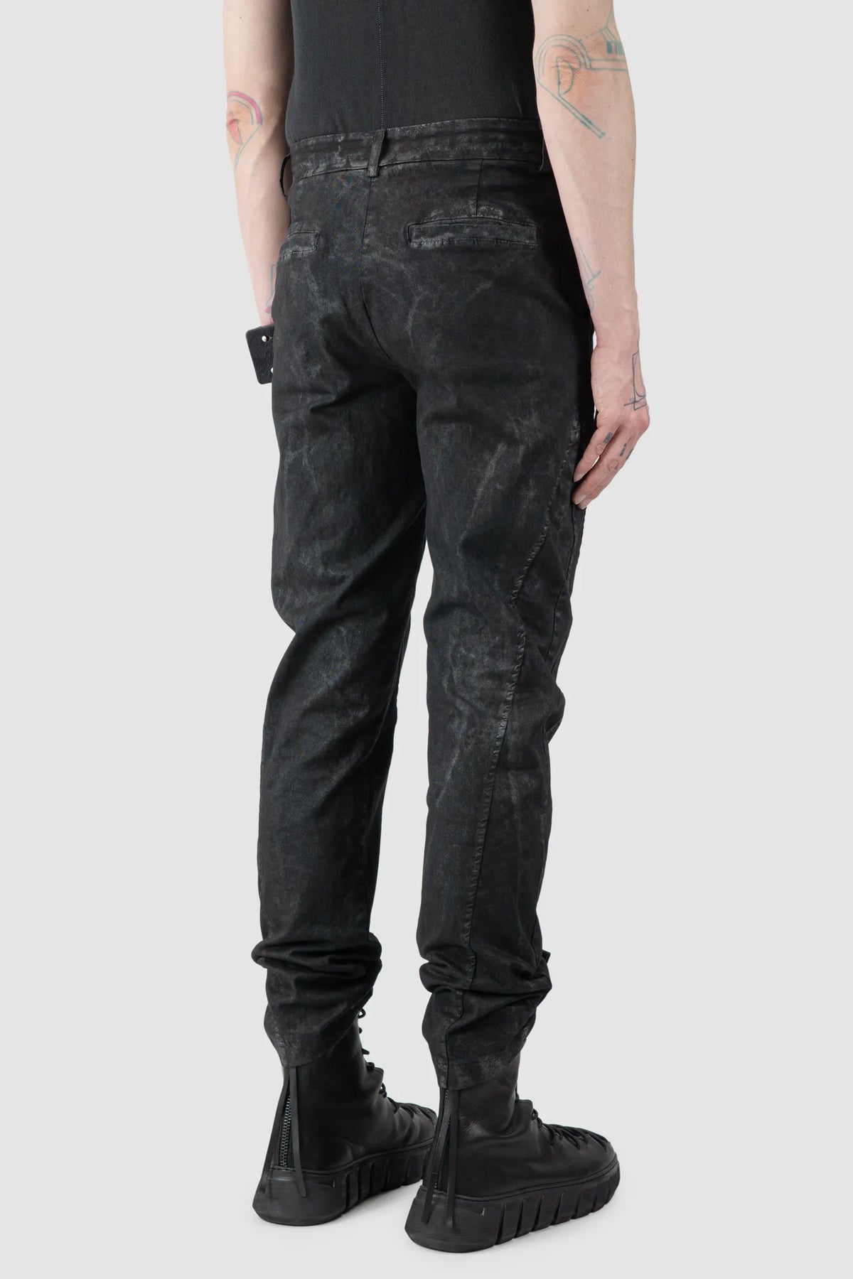 La Haine Inside Us - Men's Black Coated Stretch Denim Jeans - Model back side view La Haine Inside Us - Men's Black Coated Stretch Denim Jeans - Model back side view