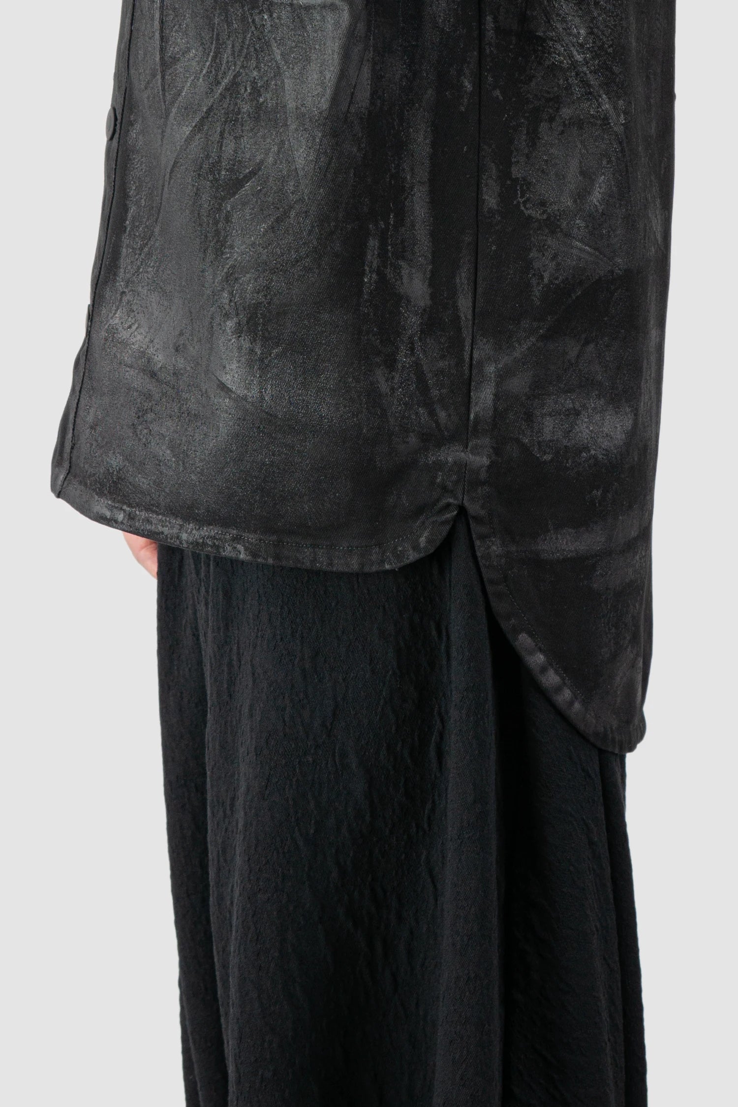 La Haine Inside Us - Men's Black Heavy Waxed Oversized Worker Denim Jacket - slit detail view La Haine Inside Us - Men's Black Heavy Waxed Oversized Worker Denim Jacket - slit detail view