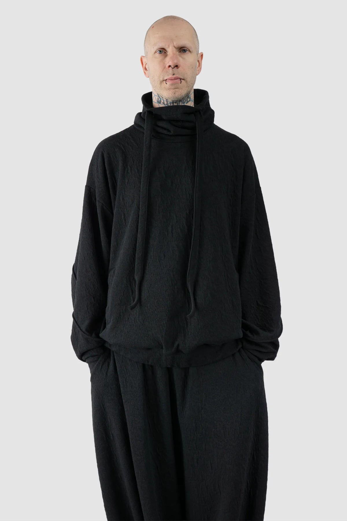 La Haine Inside Us - Men's Black High Neck Embossed Sweater - model relaxed view La Haine Inside Us - Men's Black High Neck Embossed Sweater - model relaxed view