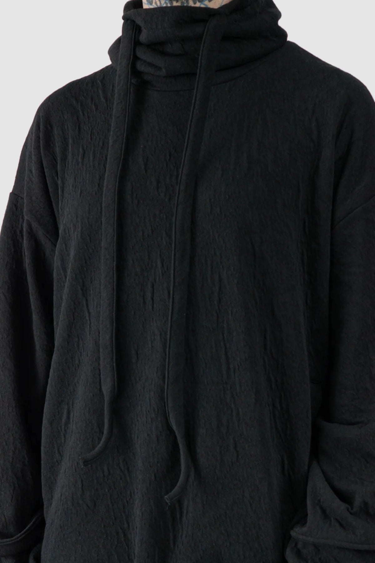 La Haine Inside Us - Men's Black High Neck Embossed Sweater - neck detail view La Haine Inside Us - Men's Black High Neck Embossed Sweater - neck detail view