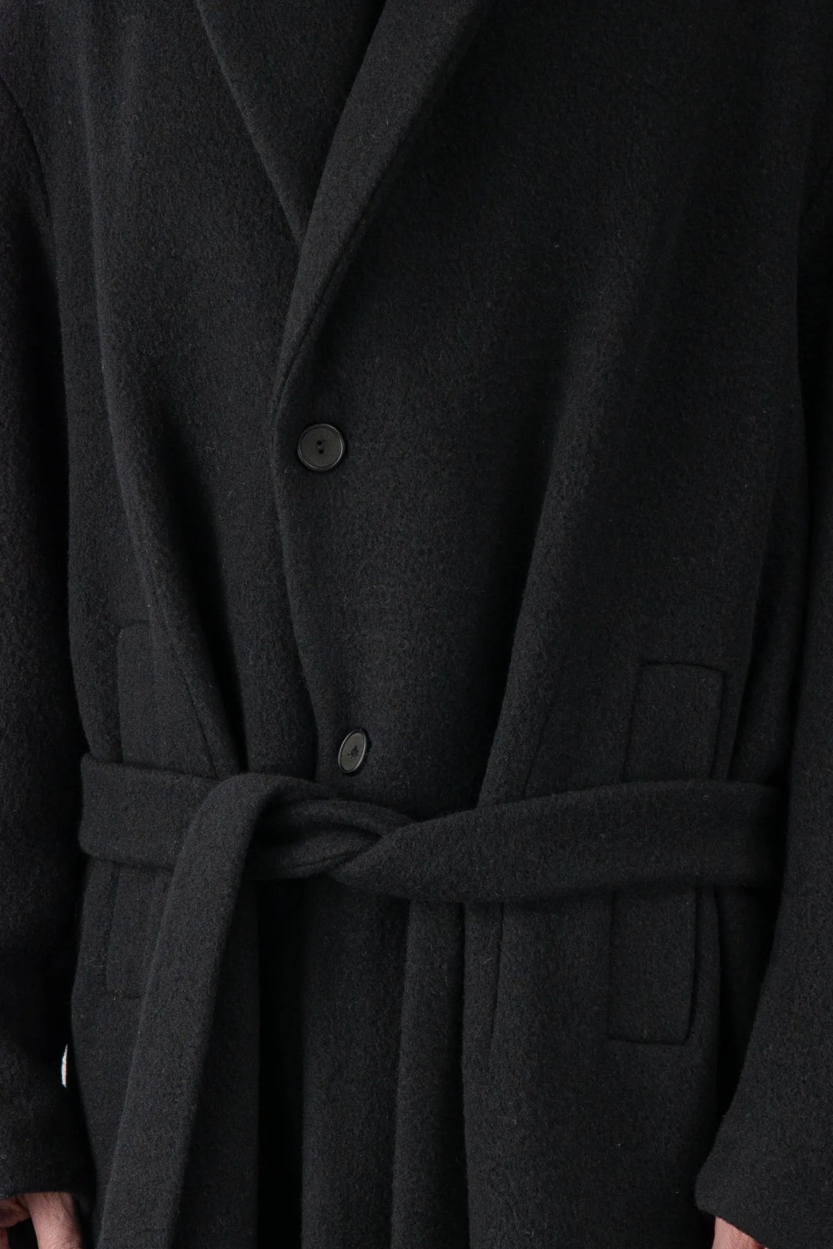 La Haine Inside Us - Men's Black Jumbo Soft Wool Blend Trench Coat - button detail view La Haine Inside Us - Men's Black Jumbo Soft Wool Blend Trench Coat - button detail view