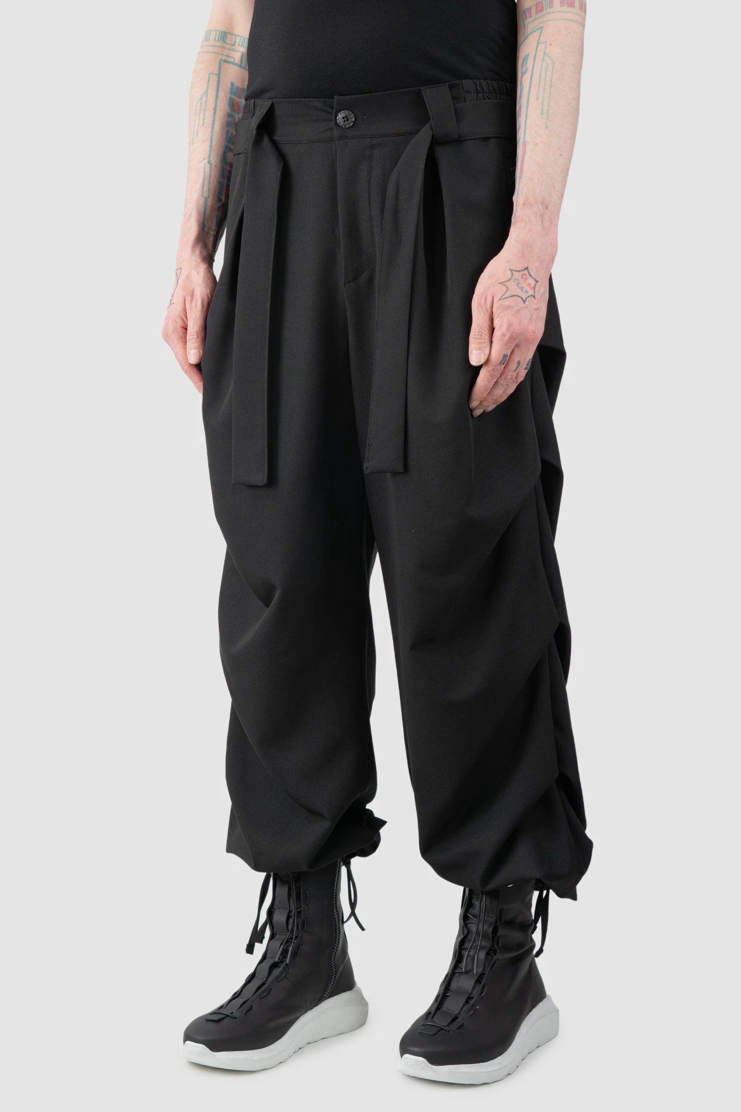 La Haine Inside Us - Men’s Black Guttered Fluid Stretch Trousers model front side view