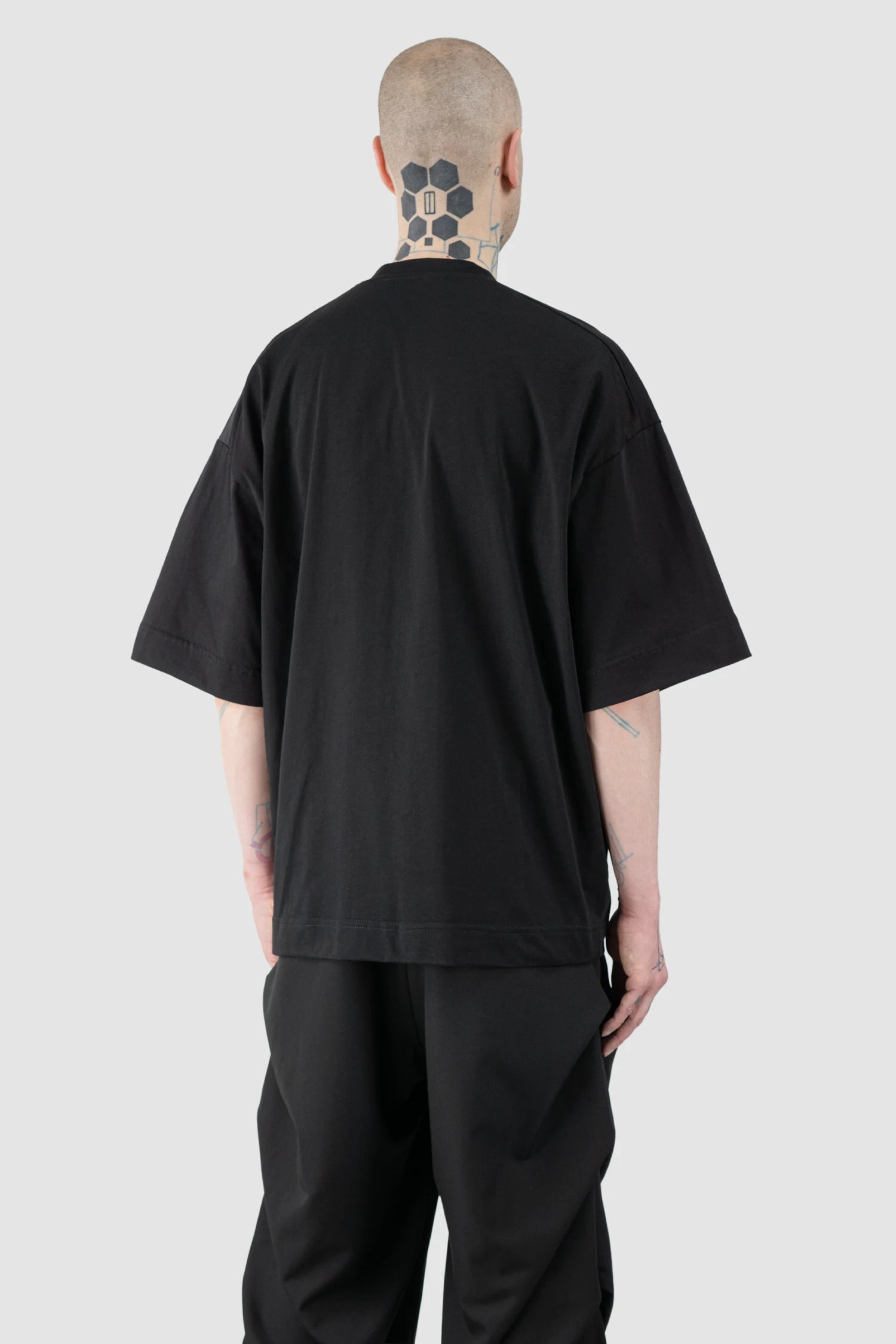 La Haine Inside Us - Men’s Black Oversized Pocket T-Shirt model back side view