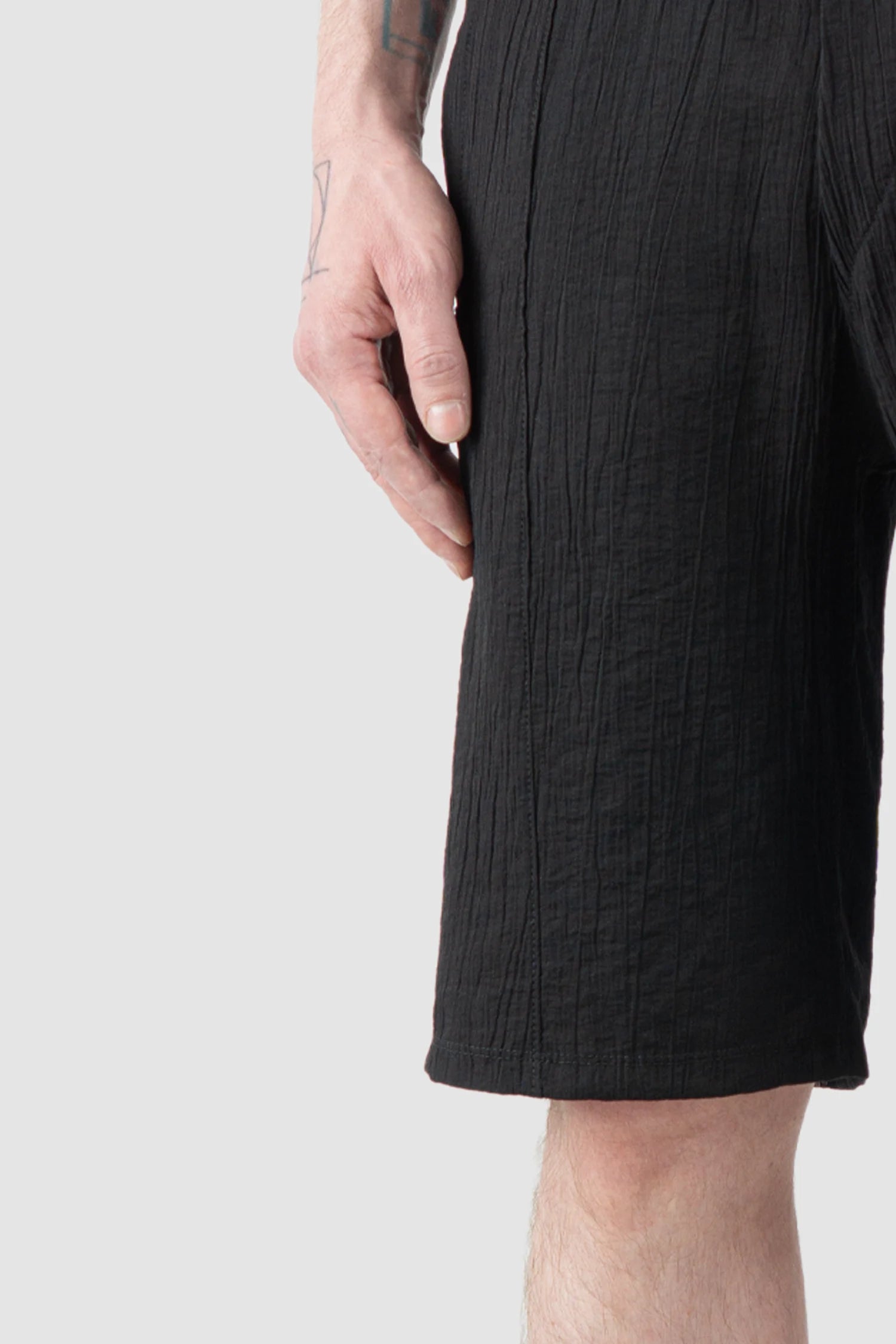 La Haine Inside Us - Men’s Black Structured Viscose Blend Shorts hem detail view