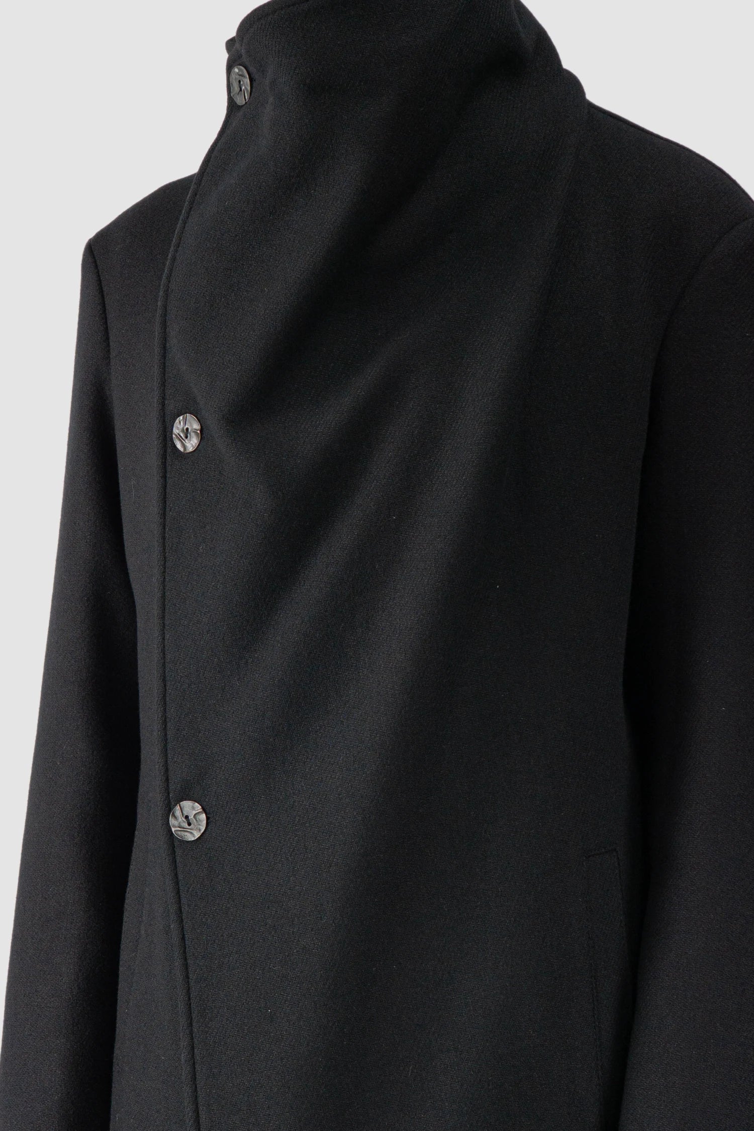 La Haine Inside Us - fabric close up view of men’s FW25 Black Asymmetric Draped High Collar Wool Jacket