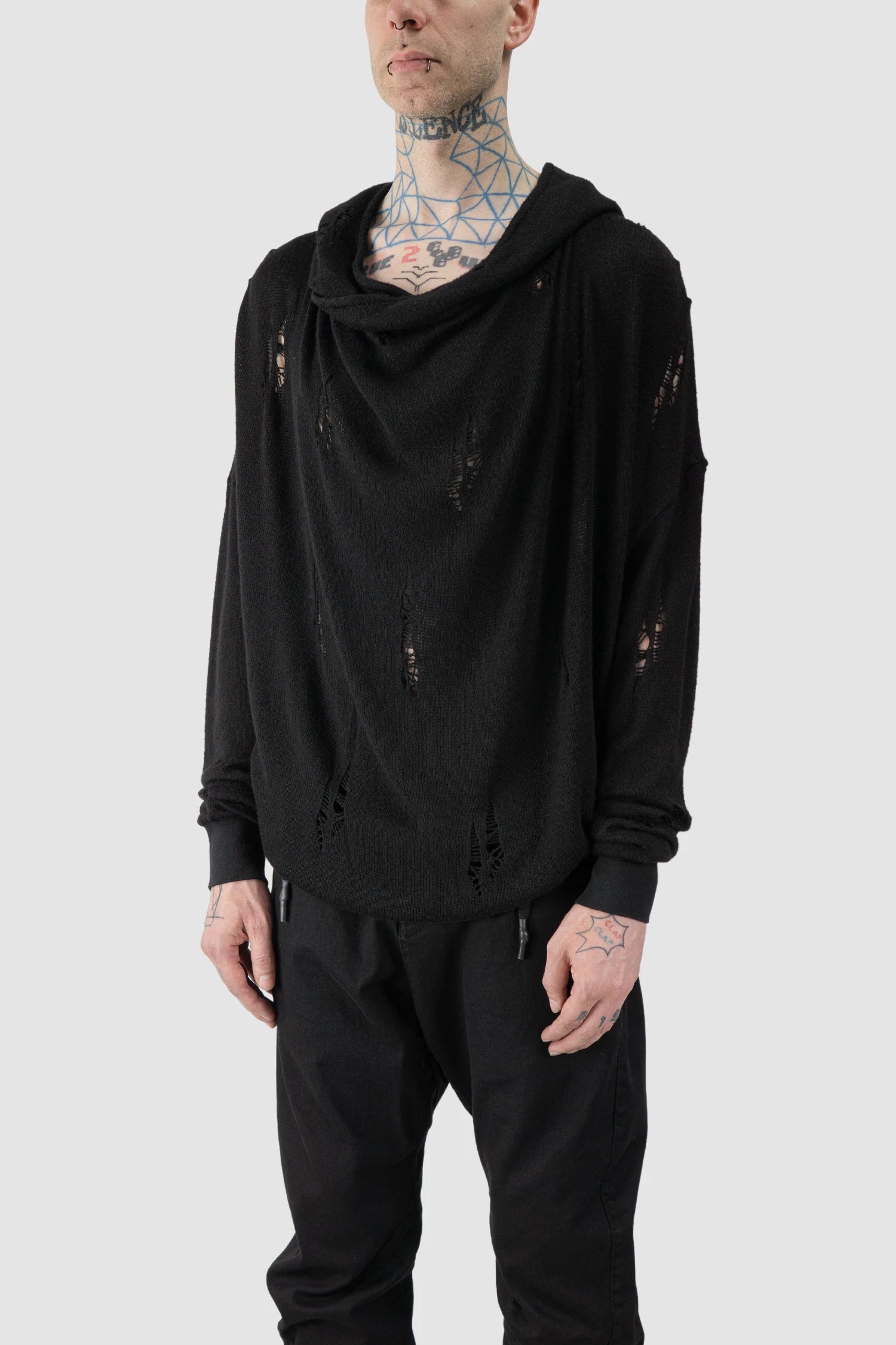 La Haine Inside Us - model side view of men’s FW25 Black Destroyed Waterfall Draping Hooded Knit Sweater