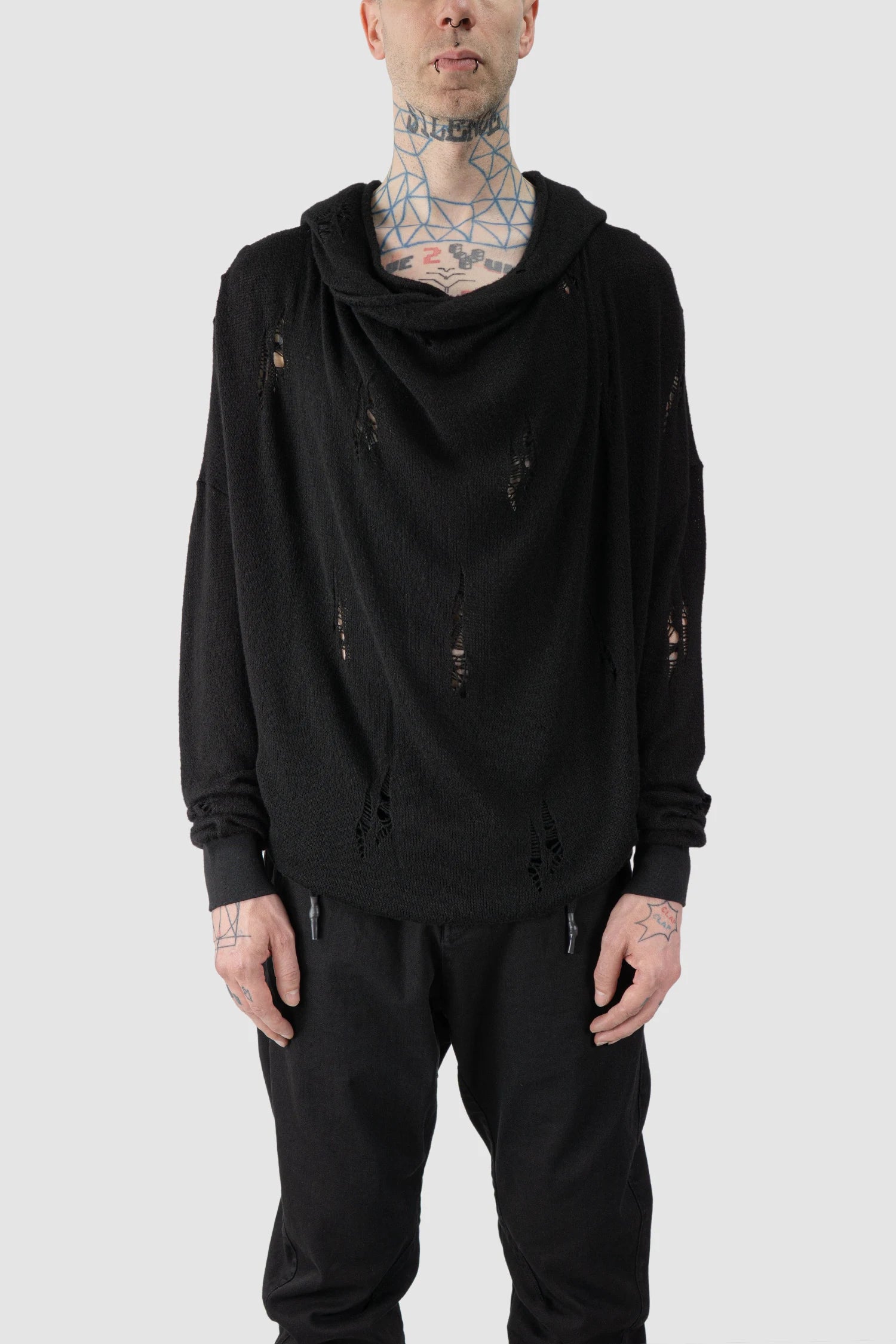 La Haine Inside Us - model front view of men’s FW25 Black Destroyed Waterfall Draping Hooded Knit Sweater