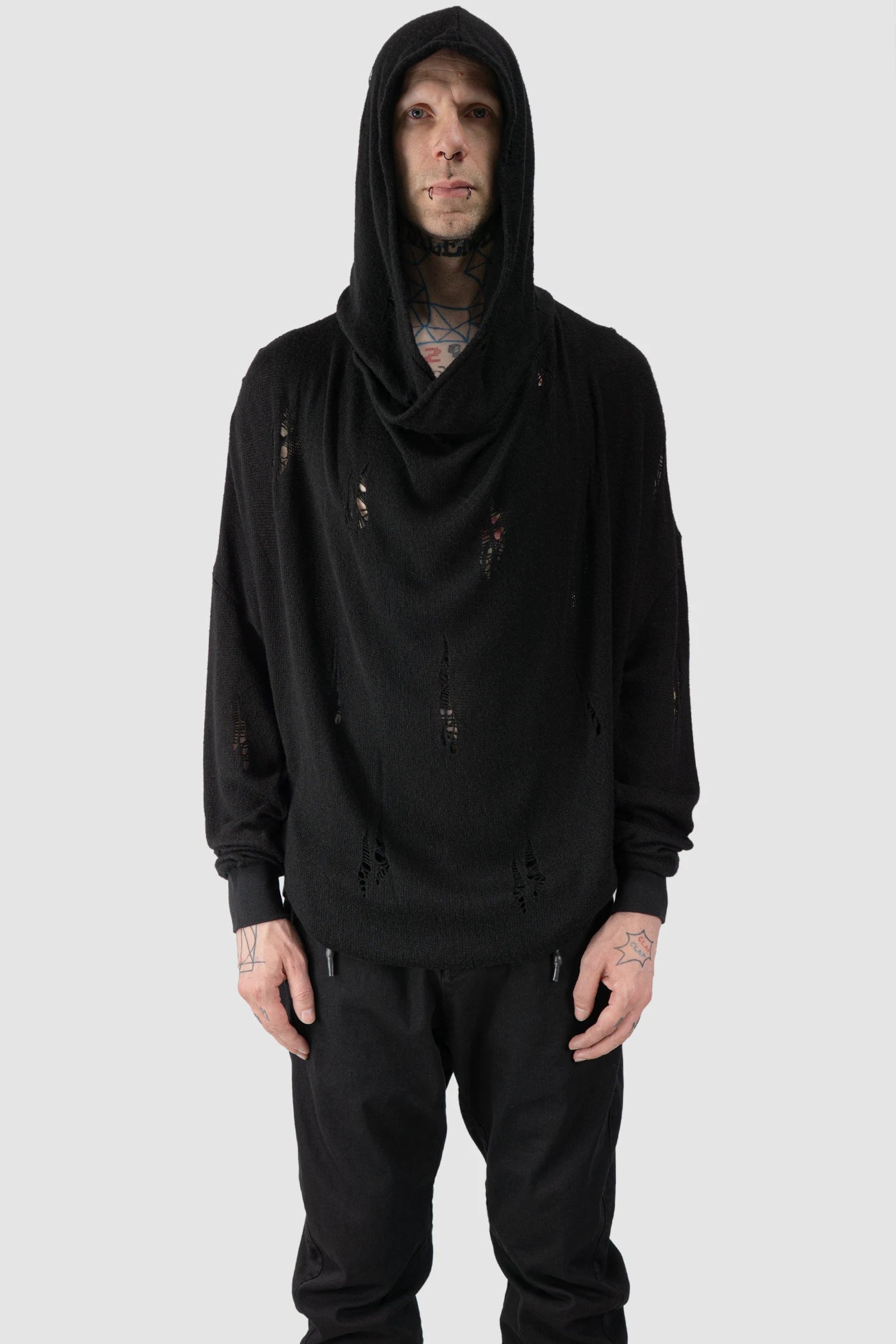 La Haine Inside Us - model hooded view of men’s FW25 Black Destroyed Waterfall Draping Hooded Knit Sweater