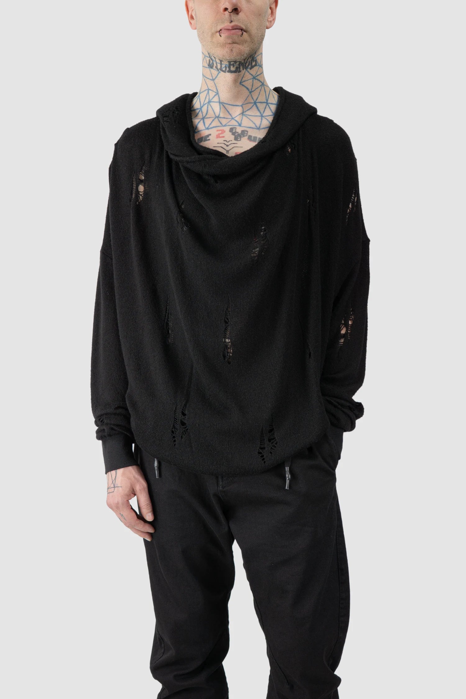 La Haine Inside Us - model front relaxed view of men’s FW25 Black Destroyed Waterfall Draping Hooded Knit Sweater