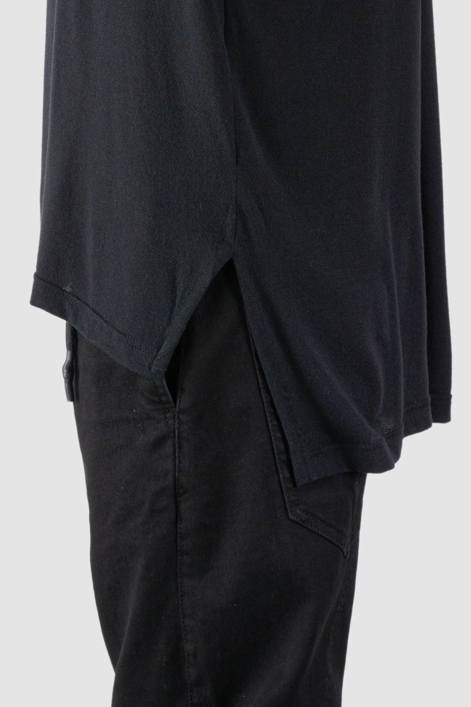 La Haine Inside Us - slit detail view of men’s FW25 Black Elongated long sleeve Cashmere Blend T-Shirt
