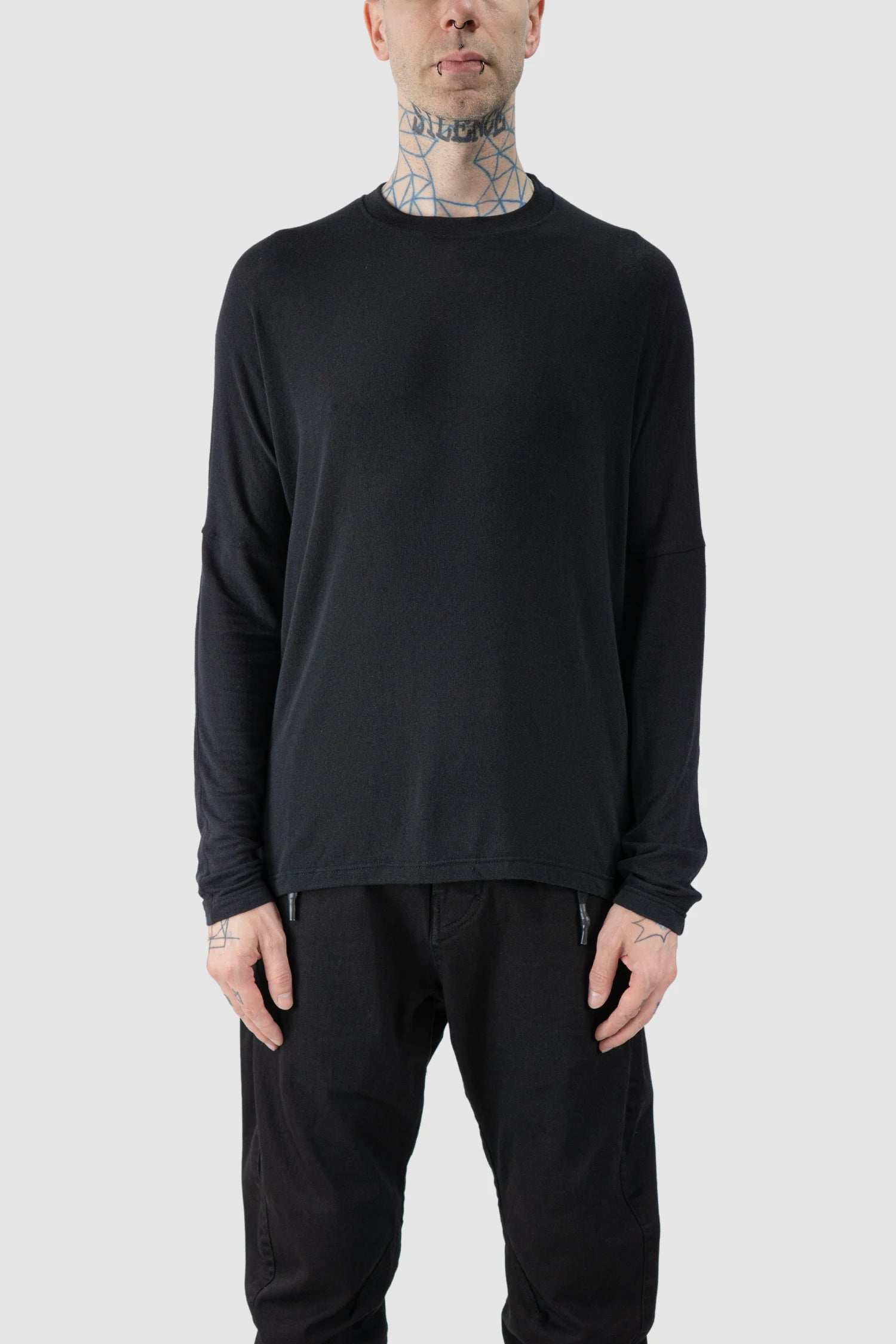 La Haine Inside Us - model front view of men’s FW25 Black Elongated long sleeve Cashmere Blend T-Shirt