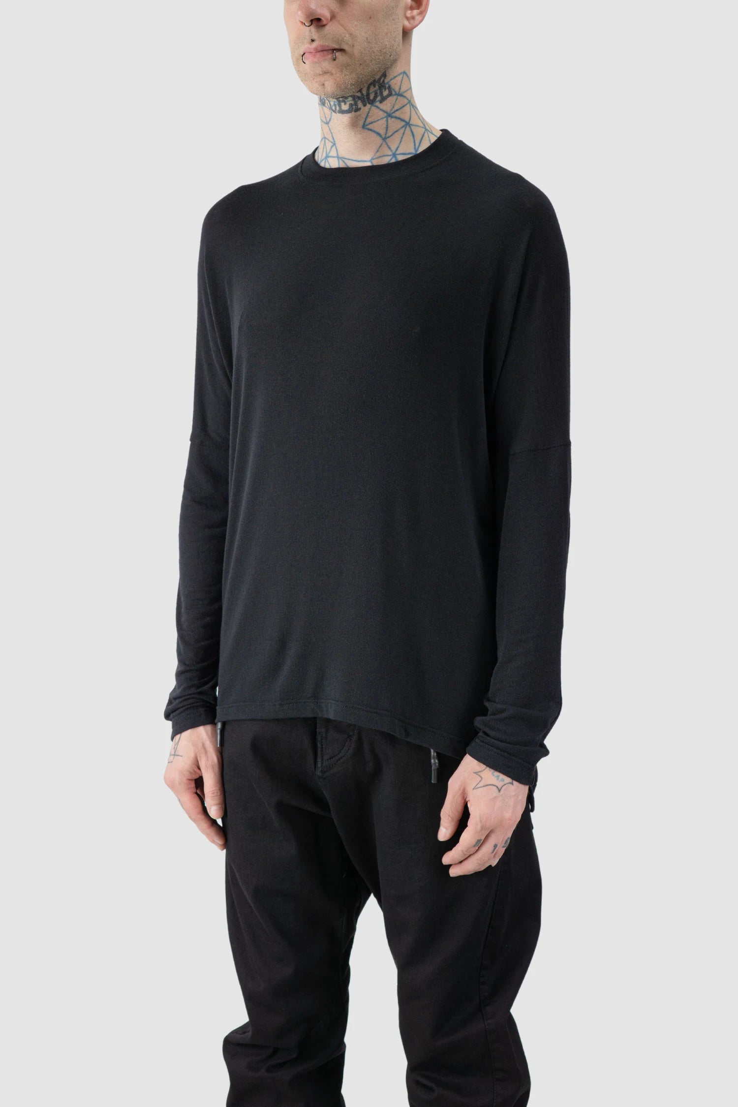 La Haine Inside Us - model front side view of men’s FW25 Black Elongated long sleeve Cashmere Blend T-Shirt